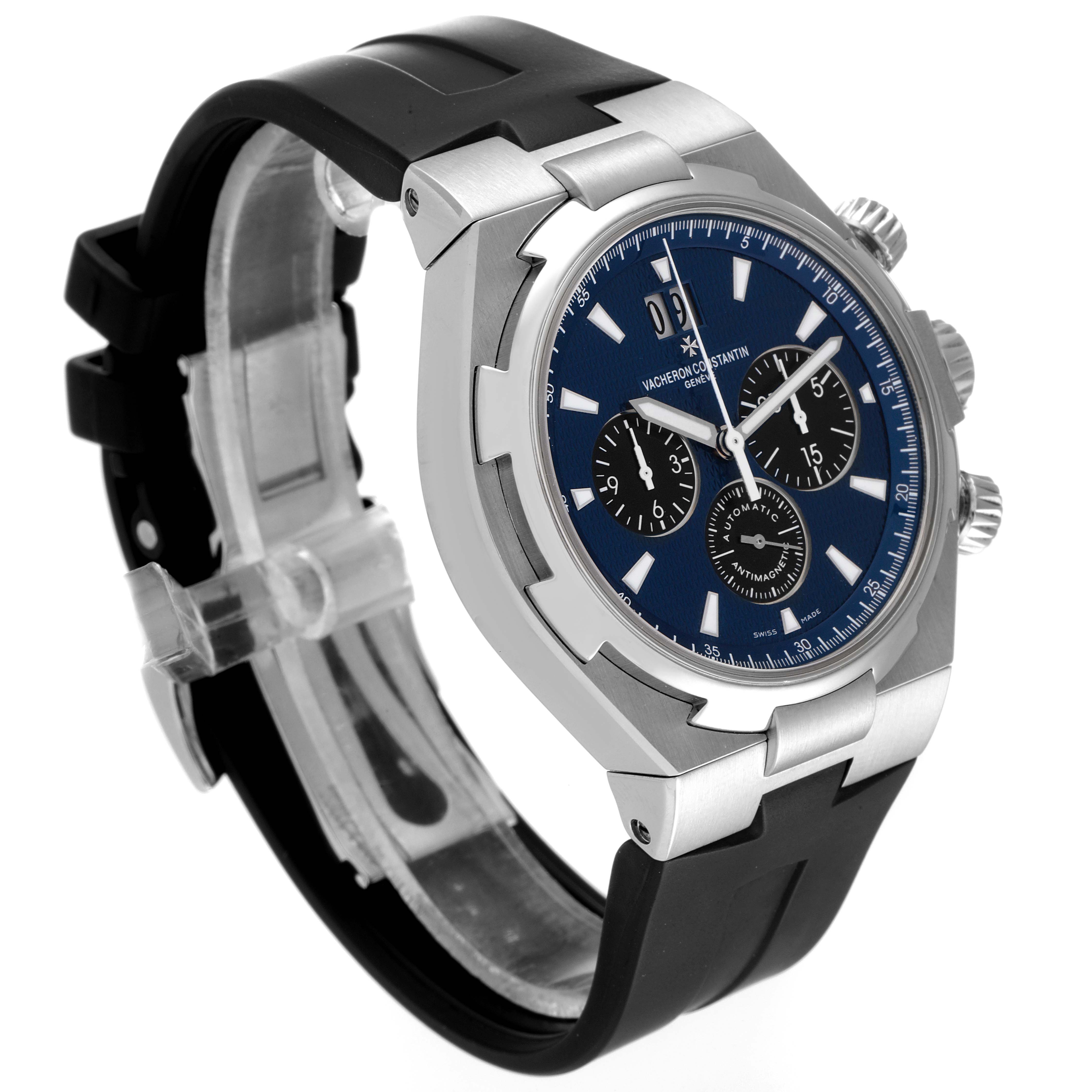 The image shows a side angle of the Vacheron Constantin Overseas 49152/000A-9540 Men's Stainless Steel Blue Dial 49152/000A-9540 Men's Stainless Steel Blue Dial model watch, highlighting its face, bezel, crown, and strap.