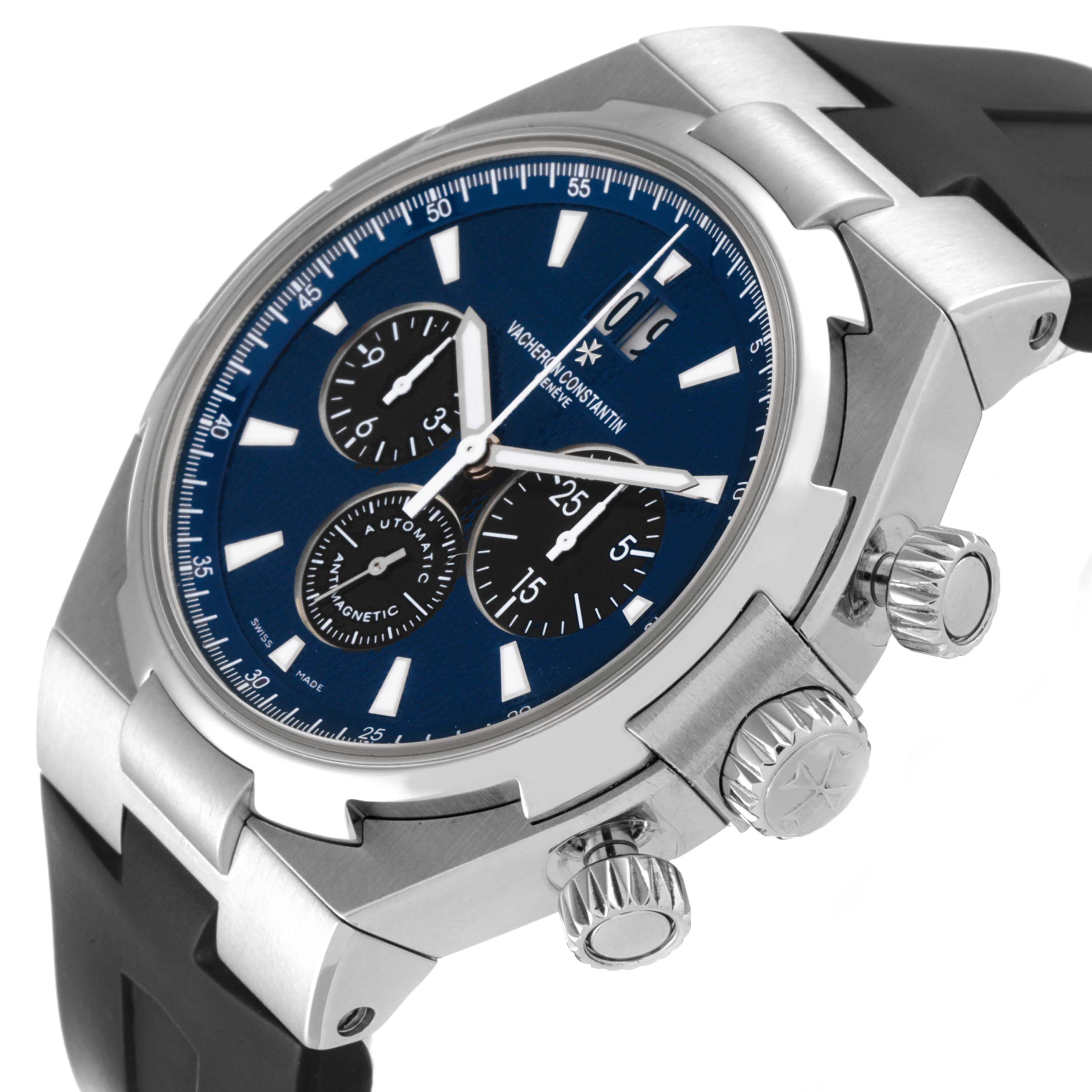 The image shows a close-up angled view of a Vacheron Constantin Overseas 49152/000A-9540 Men's Stainless Steel Blue Dial 49152/000A-9540 Men's Stainless Steel Blue Dial watch, highlighting the crown, pushers, and part of the dial.