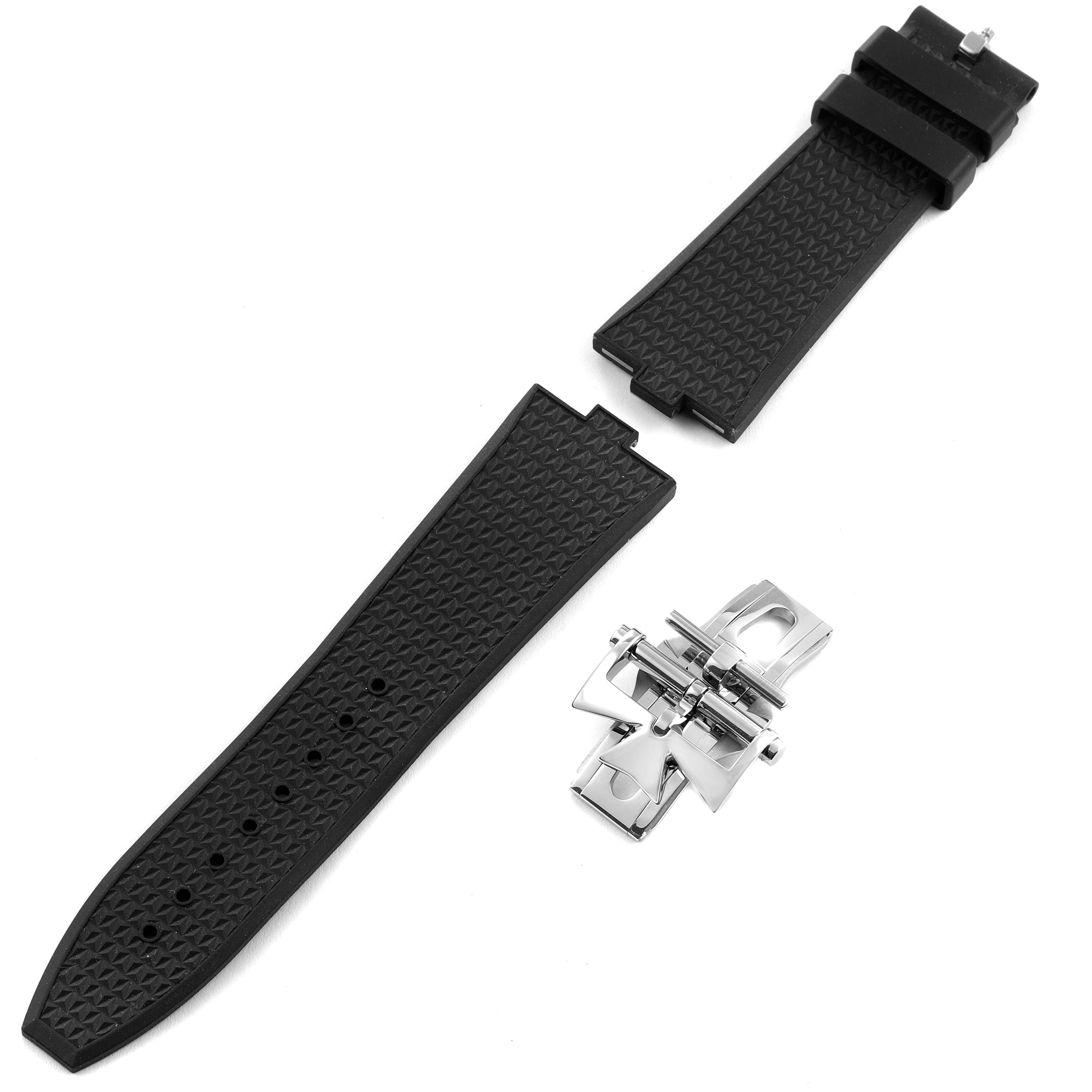 The image shows an unassembled black rubber strap and a stainless steel clasp for the Vacheron Constantin Overseas 4500V/110A-B126 Men's Stainless Steel Silver Dial 4500V/110A-B126 Men's Stainless Steel Silver Dial model watch, viewed from above.