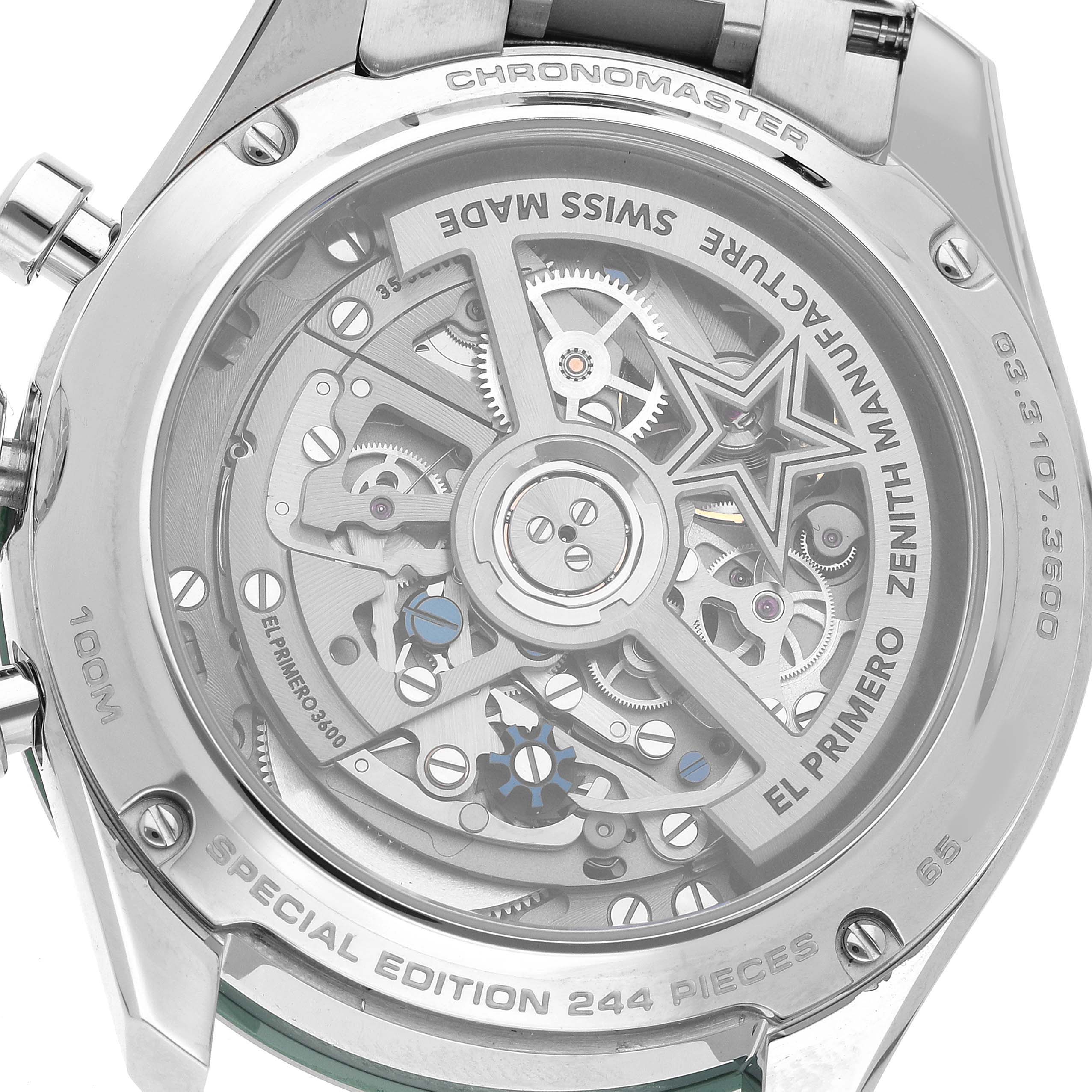 The image shows the back view of a Zenith Chronomaster 03.3107.3600 Men's Stainless Steel Green Dial, displaying its intricate movement and rotor through a transparent case back.