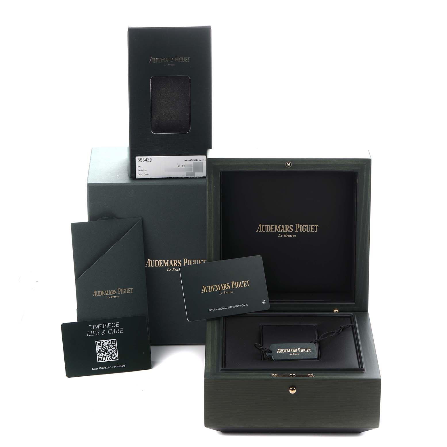 The image shows the packaging and accessories for an Audemars Piguet Jules model, model number 26393ST.OO.A348KB.01, including a box and documentation.