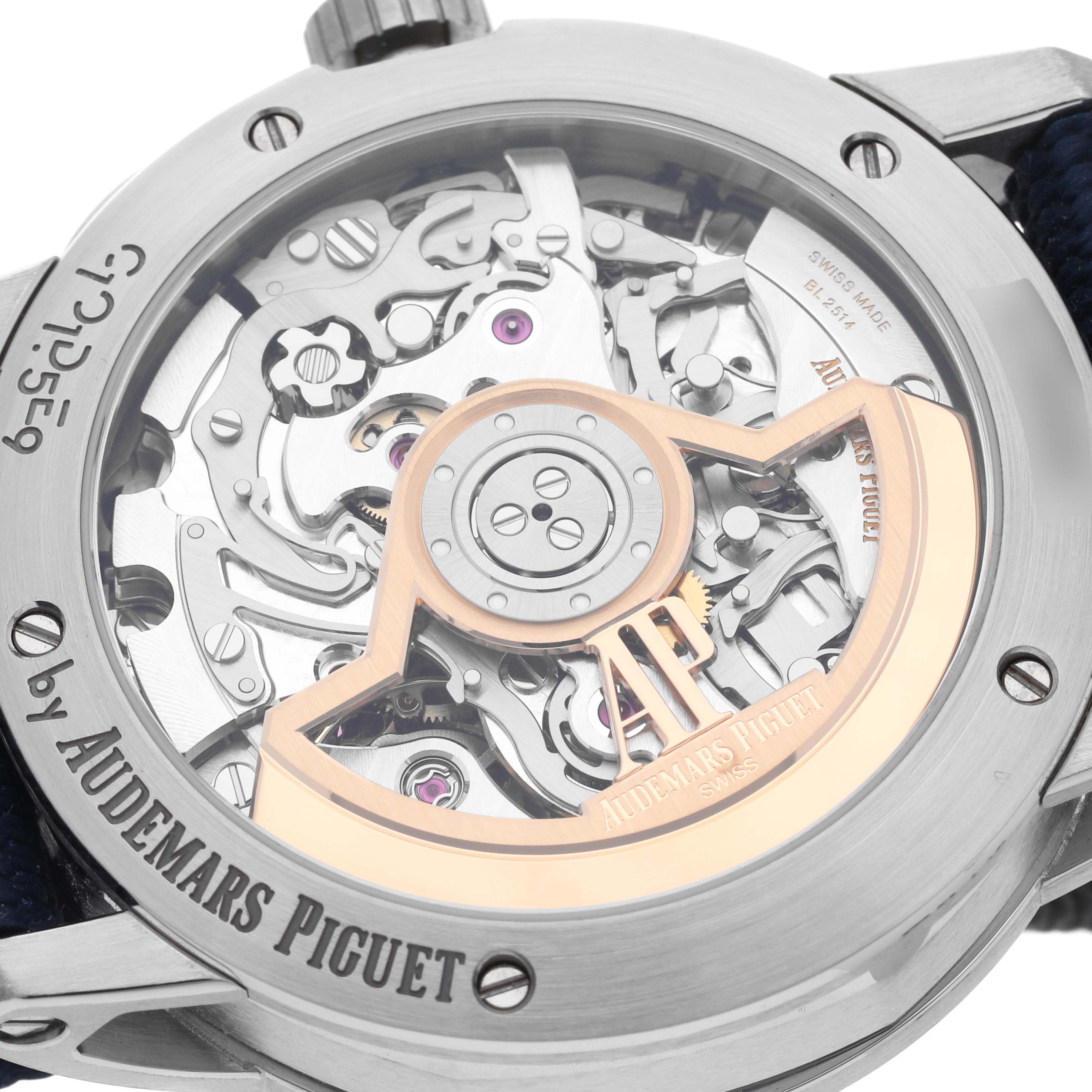 The image shows the back view of an Audemars Piguet Jules 26393ST.OO.A348KB.01 Men's Stainless Steel Blue Dial 26393ST.OO.A348KB.01 Men's Stainless Steel Blue Dial watch, highlighting the intricate movement and rotor.