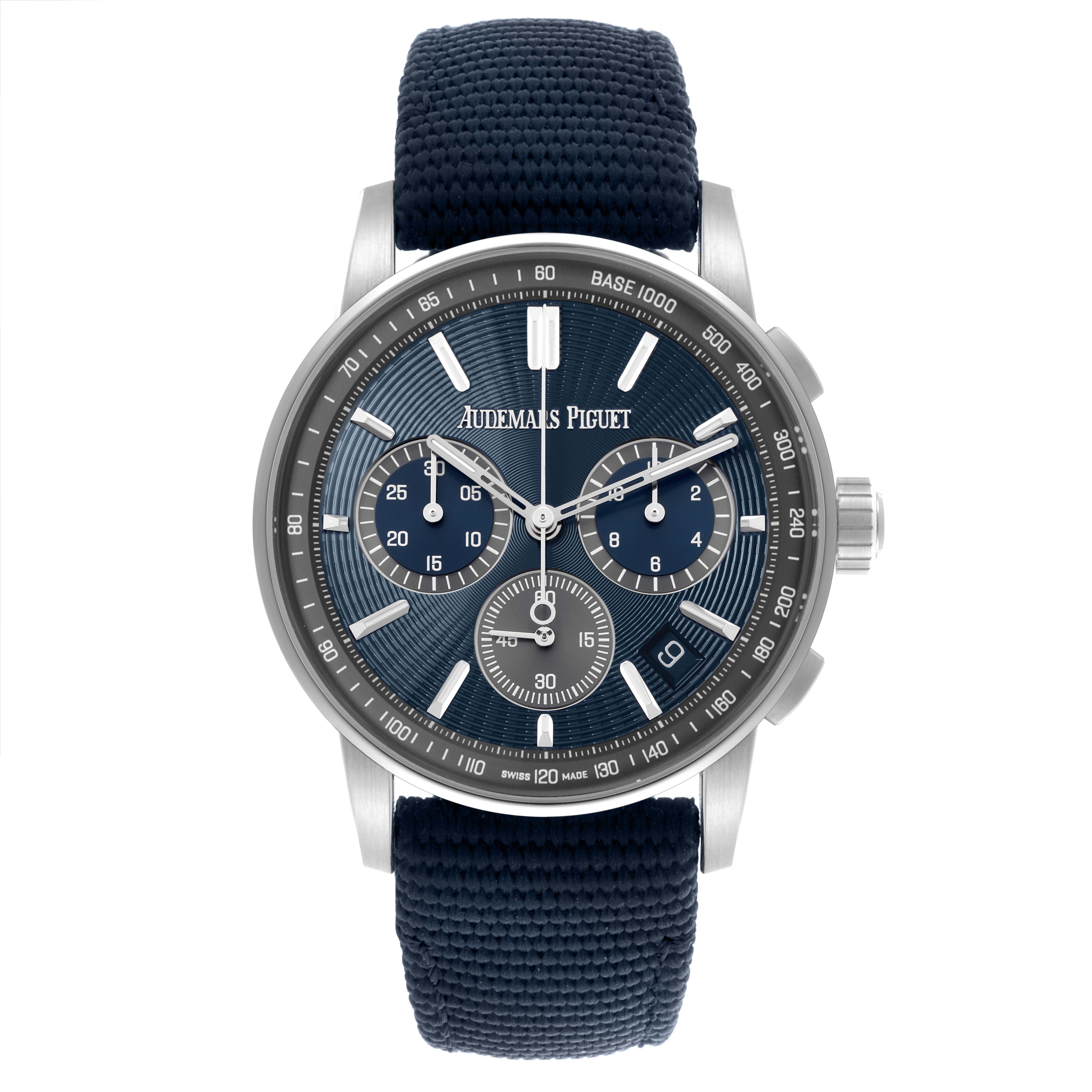 The Audemars Piguet Jules 26393ST.OO.A348KB.01 Men's Stainless Steel Blue Dial 26393ST.OO.A348KB.01 Men's Stainless Steel Blue Dial model watch is shown from a front angle, highlighting its blue textured dial, subdials, and strap.