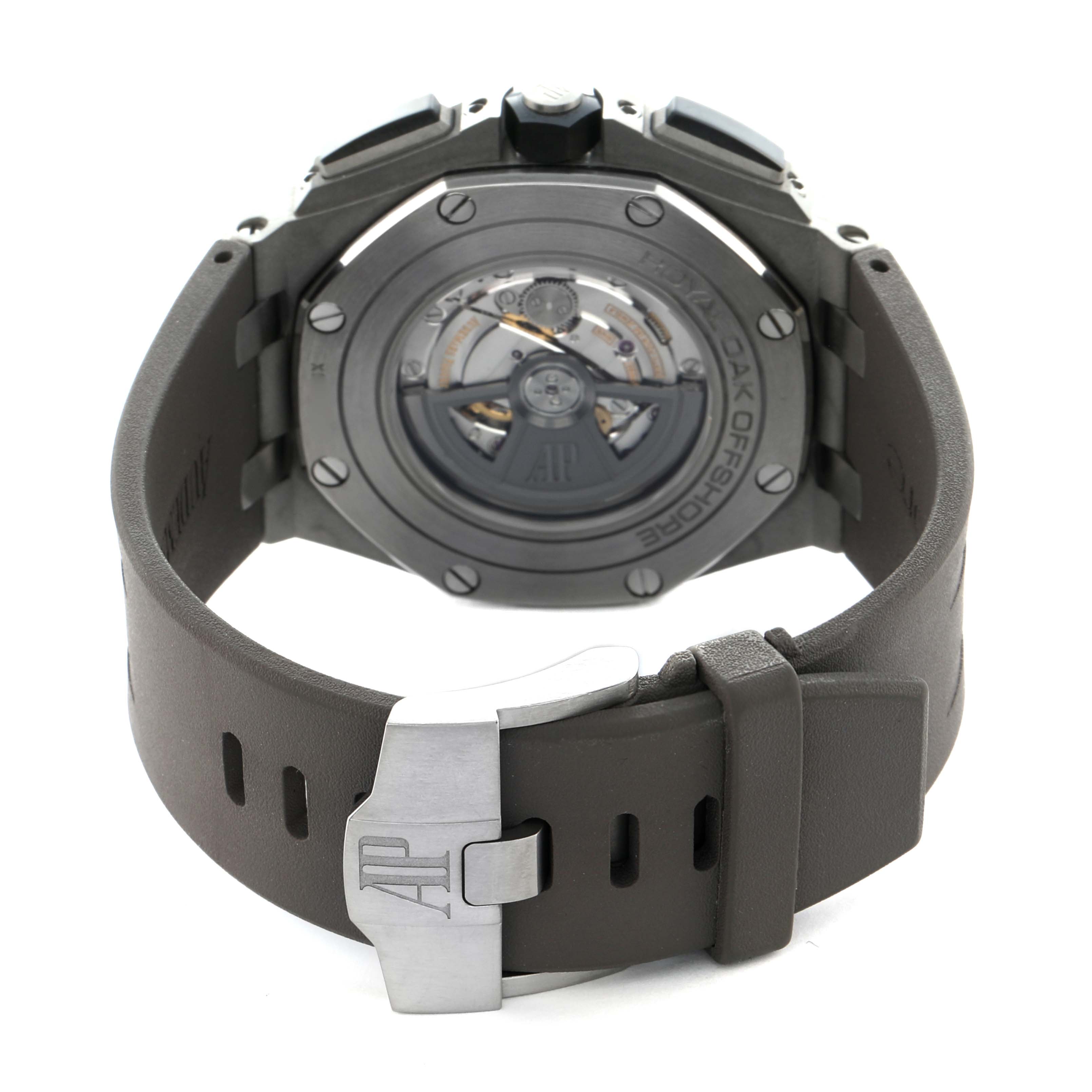 The image shows the back view of an Audemars Piguet Royal Oak Offshore 26400IO.OO.A004CA.01 Men's Titanium Grey Dial, highlighting the case back and buckle.
