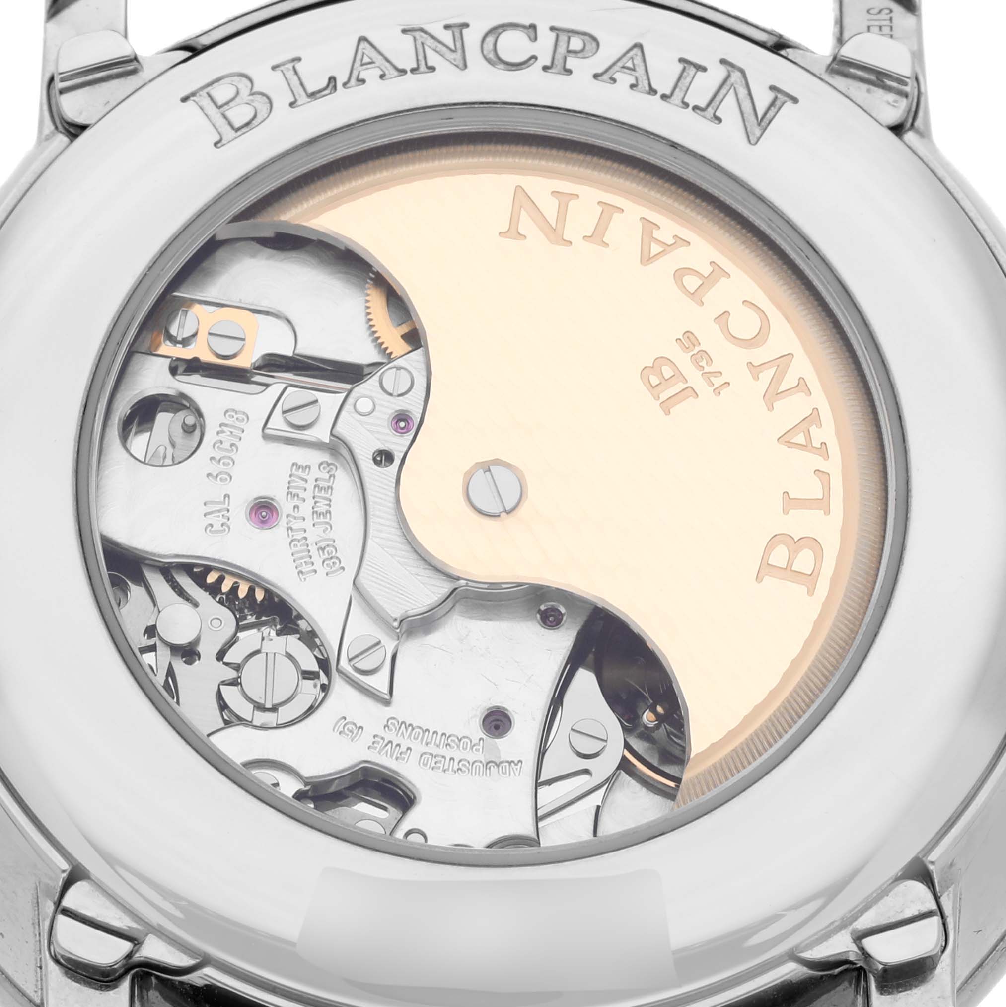 The image shows the case back of a Blancpain Villeret 6685-1127-55B Men's Stainless Steel White Dial 6685-1127-55B Men's Stainless Steel White Dial watch, revealing its intricate mechanical movement.