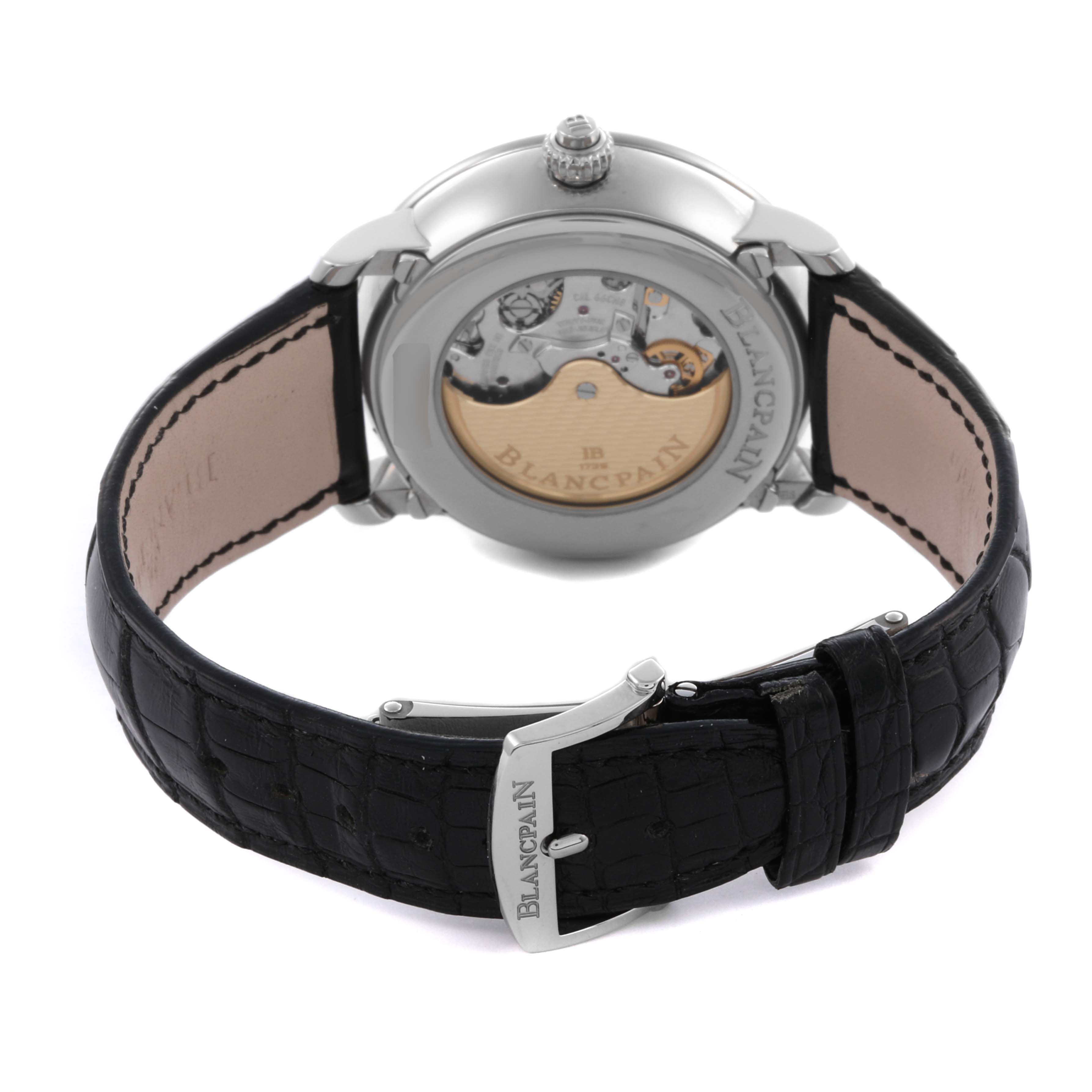 The image shows the back view of a Blancpain Villeret 6685-1127-55B Men's Stainless Steel White Dial 6685-1127-55B Men's Stainless Steel White Dial watch, highlighting the movement through the transparent case back and black leather strap.