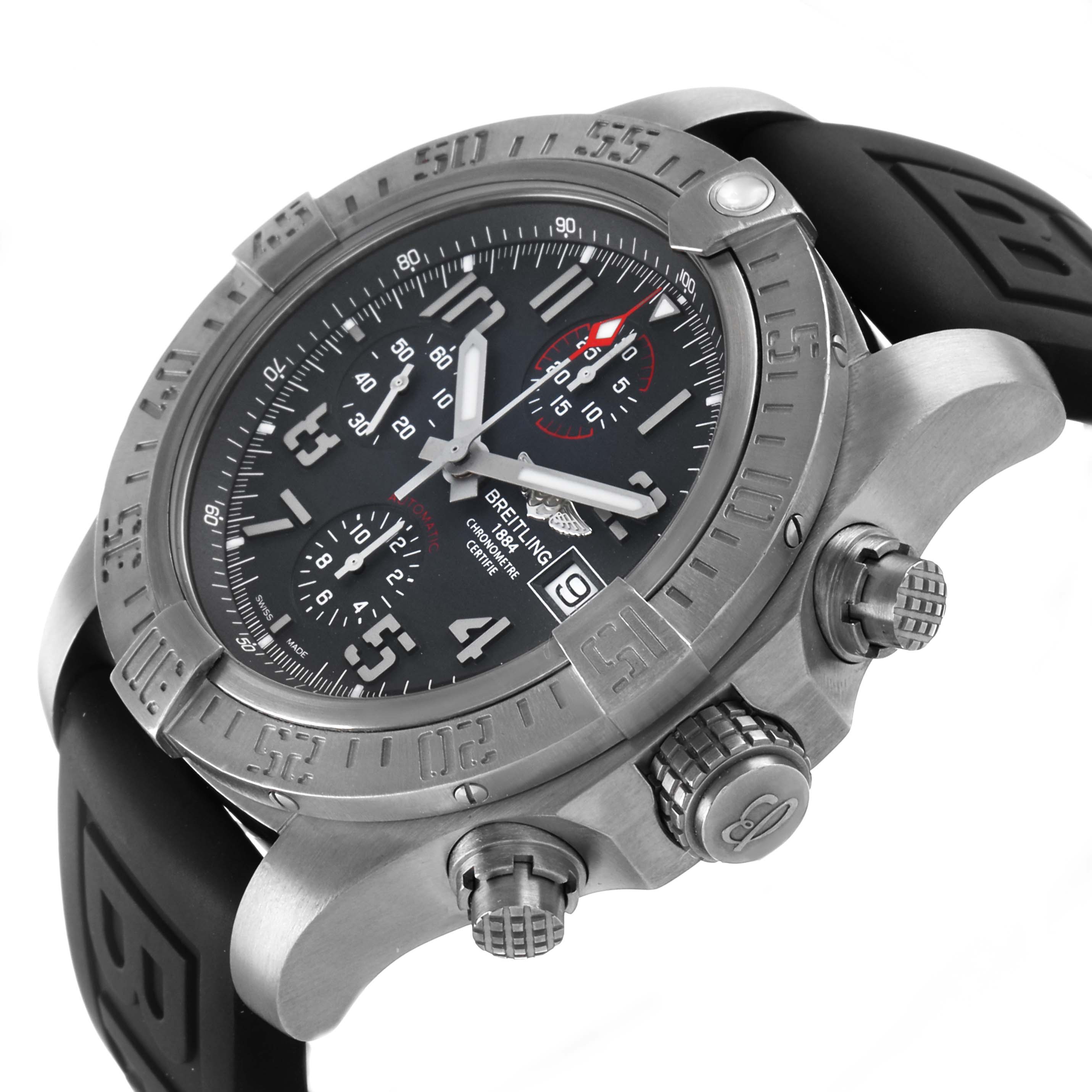 The Breitling Avenger E13383 Men's Titanium Grey Dial watch is shown from a side angle, highlighting the crown, pushers, and bezel details.