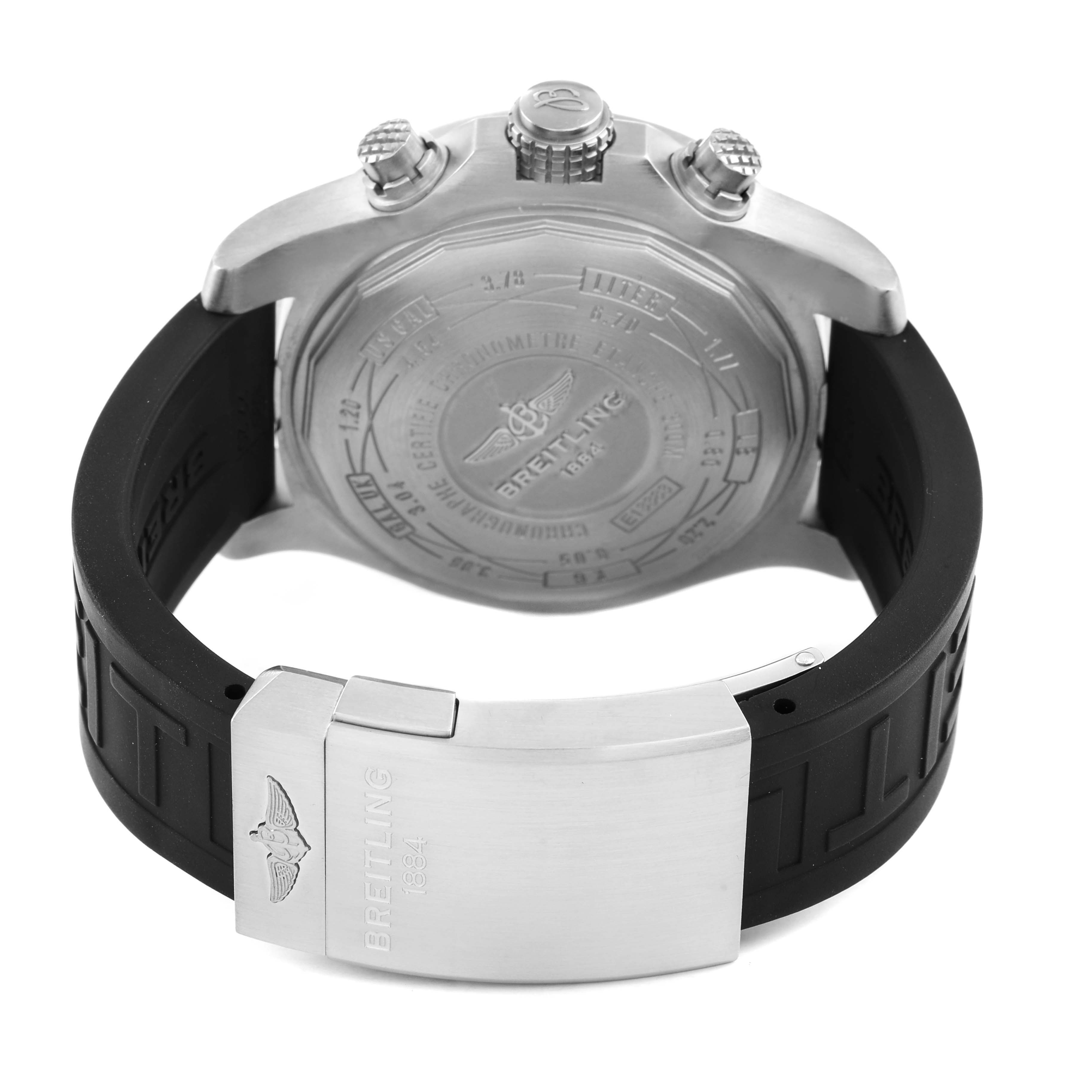 The Breitling Avenger E13383 Men's Titanium Grey Dial watch is shown from the back, featuring the case back, crown, pushers, and rubber strap with clasp.