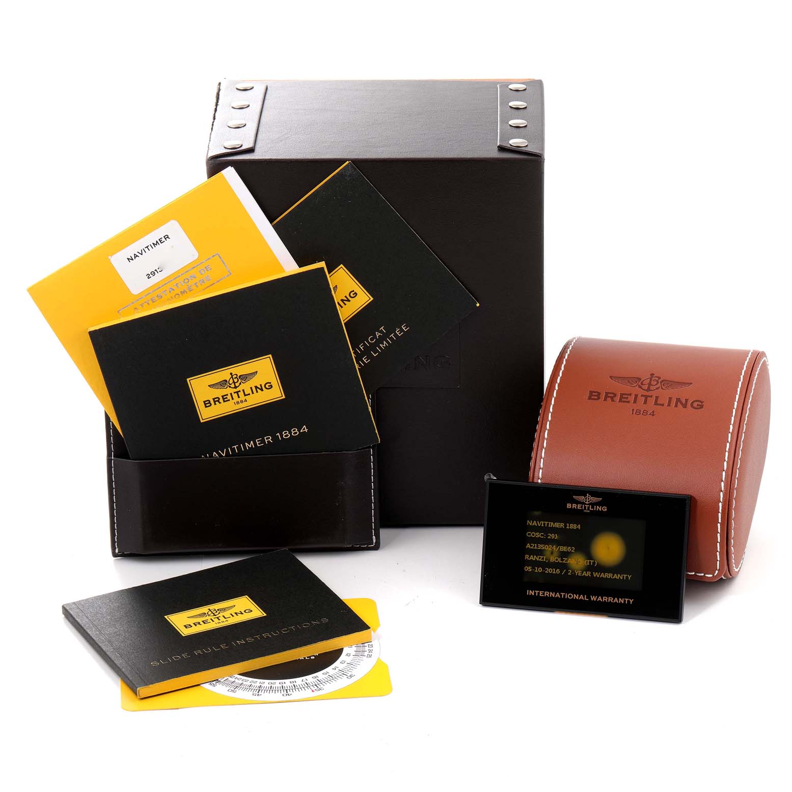 The image shows Breitling Navitimer A2135024/BE62-453A Men's Stainless Steel Black Dial A2135024/BE62-453A Men's Stainless Steel Black Dial accessories, including manuals, warranty card, a brown case, and a black box.