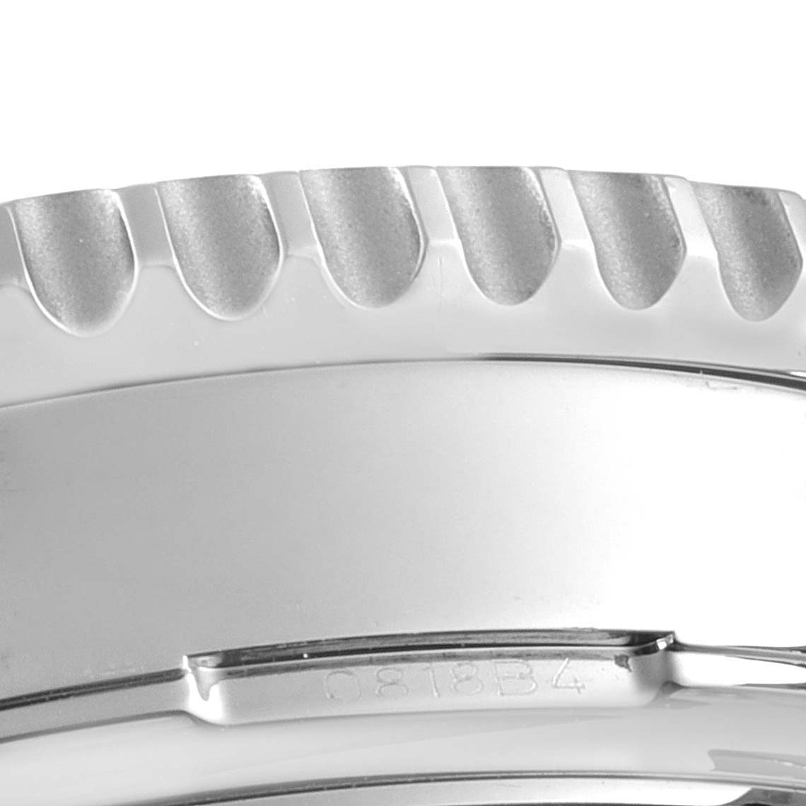 This image shows a close-up of the bezel and part of the casing of a Breitling Navitimer AB044121/BD24/443A Men's Stainless Steel Black Dial AB044121/BD24/443A Men's Stainless Steel Black Dial watch.