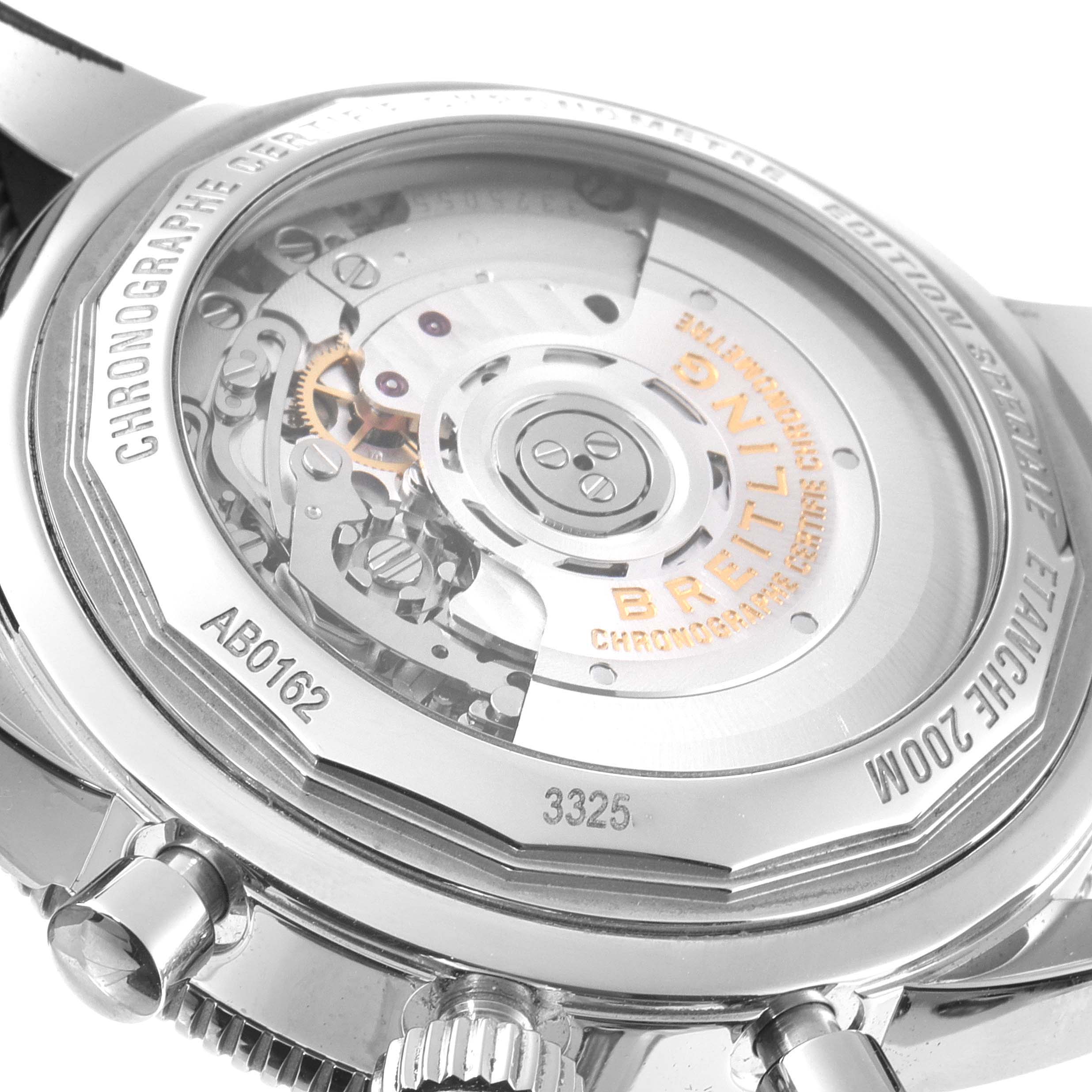 The image shows the back view of a Breitling Superocean AB0162 Men's Stainless Steel Silver Dial AB0162 Men's Stainless Steel Silver Dial watch, highlighting its intricate movement and case engravings.