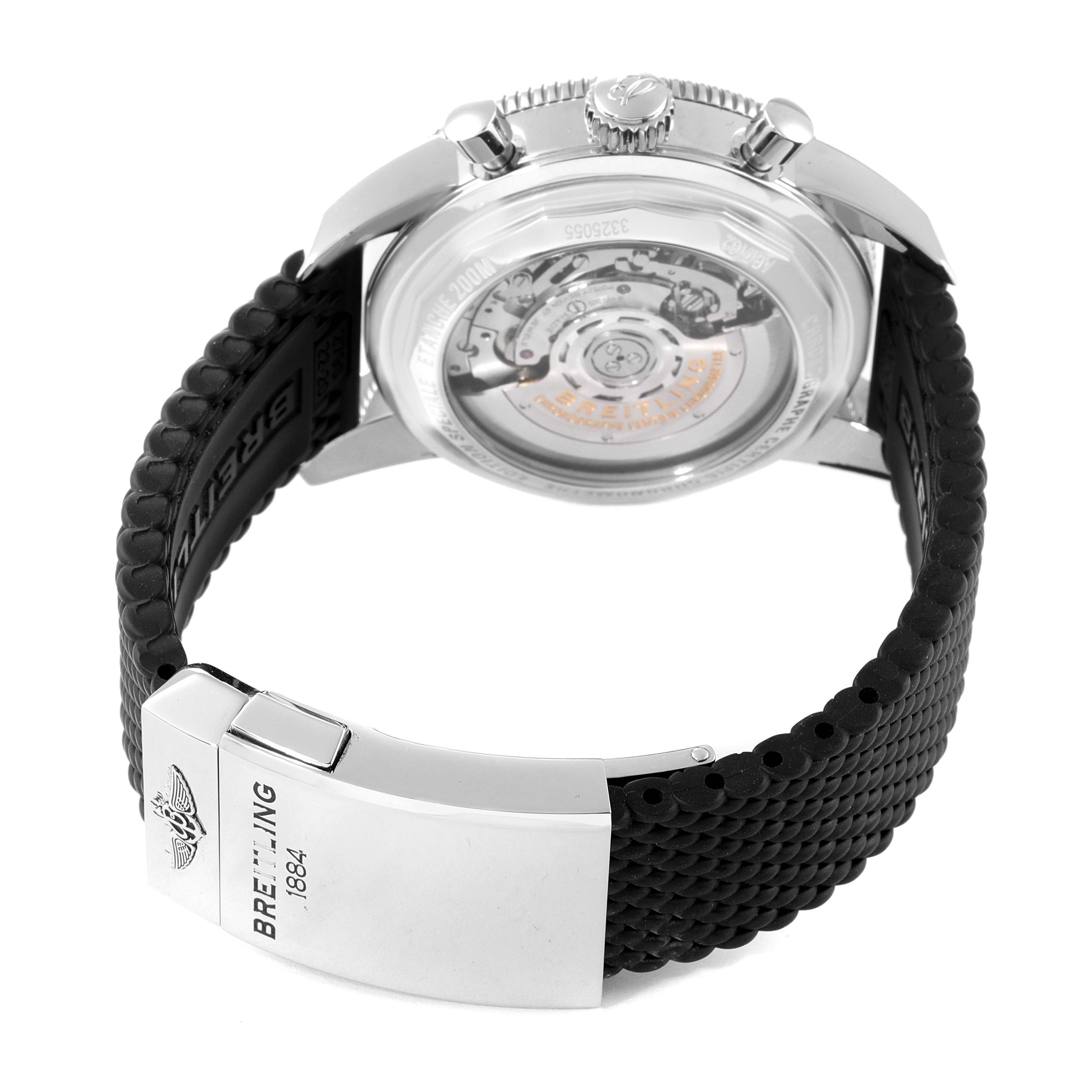 The image shows the back view of a Breitling Superocean AB0162 Men's Stainless Steel Silver Dial AB0162 Men's Stainless Steel Silver Dial watch, highlighting the movement, crown, and rubber strap with a clasp.