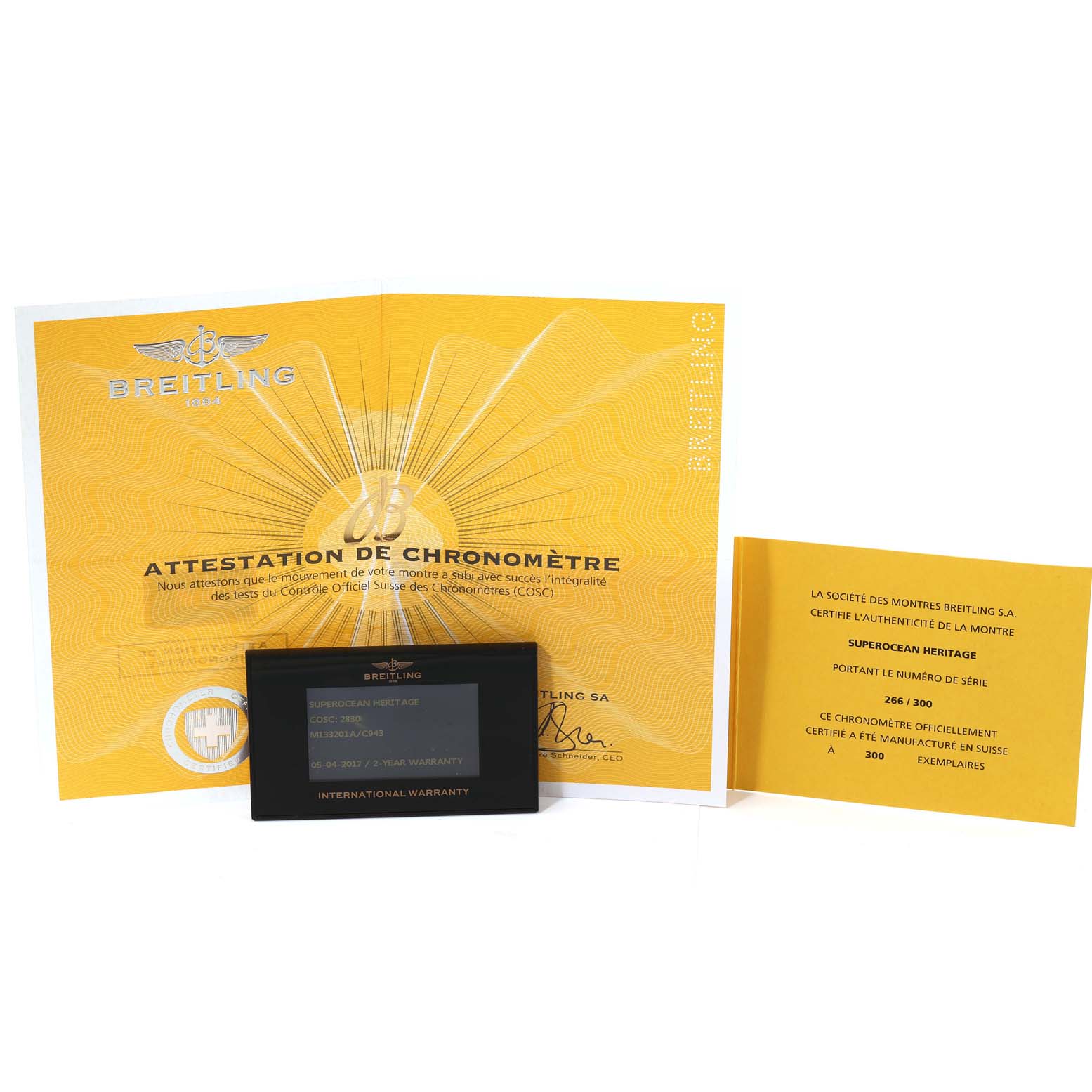 This image shows the certification documents and warranty card for the Breitling Limited Series watch model, Superocean Heritage.