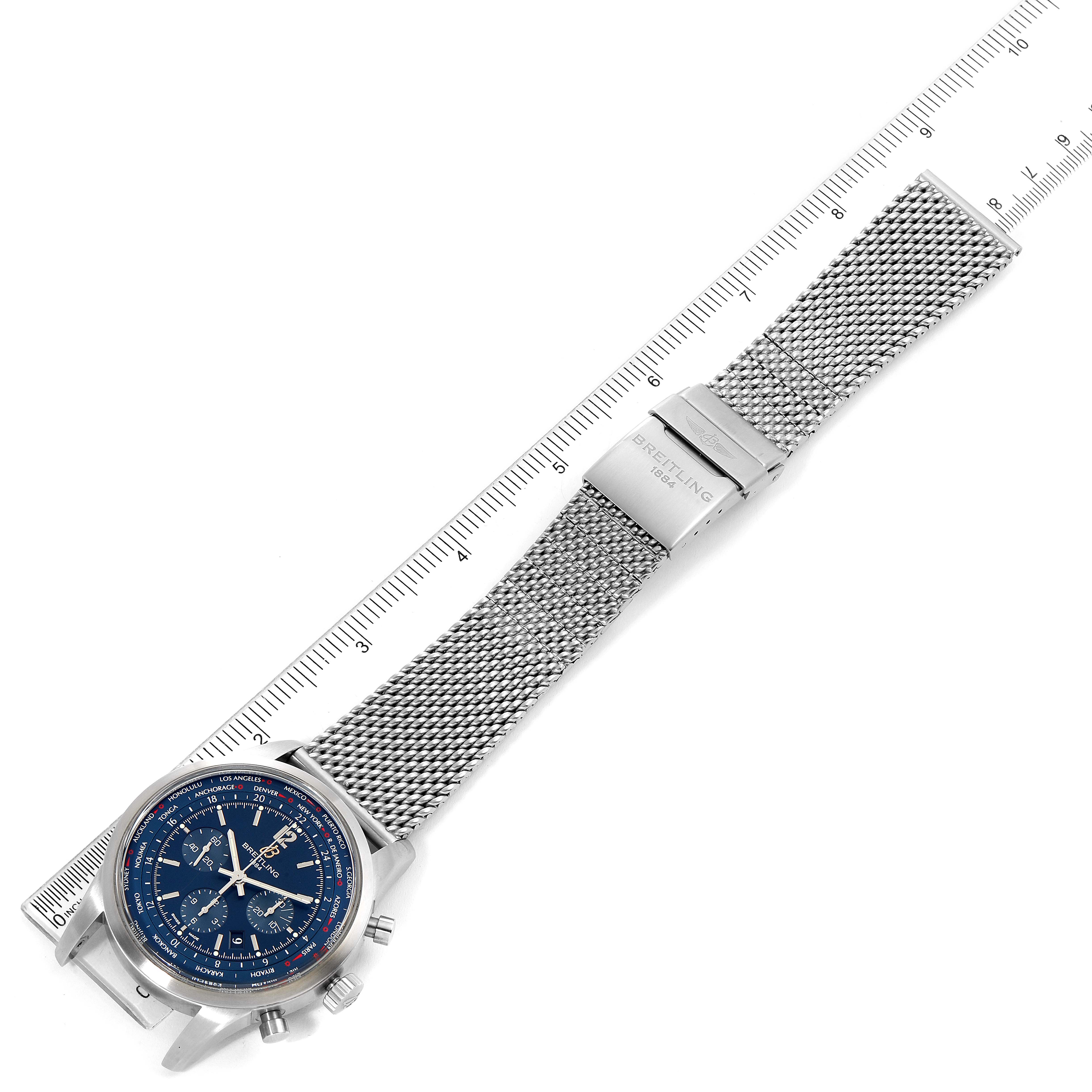 The Breitling Transocean AB0510  Men's Stainless Steel Blue Dial AB0510  Men's Stainless Steel Blue Dial watch is shown from an overhead angle, revealing its mesh strap, dial, case, and clasp.