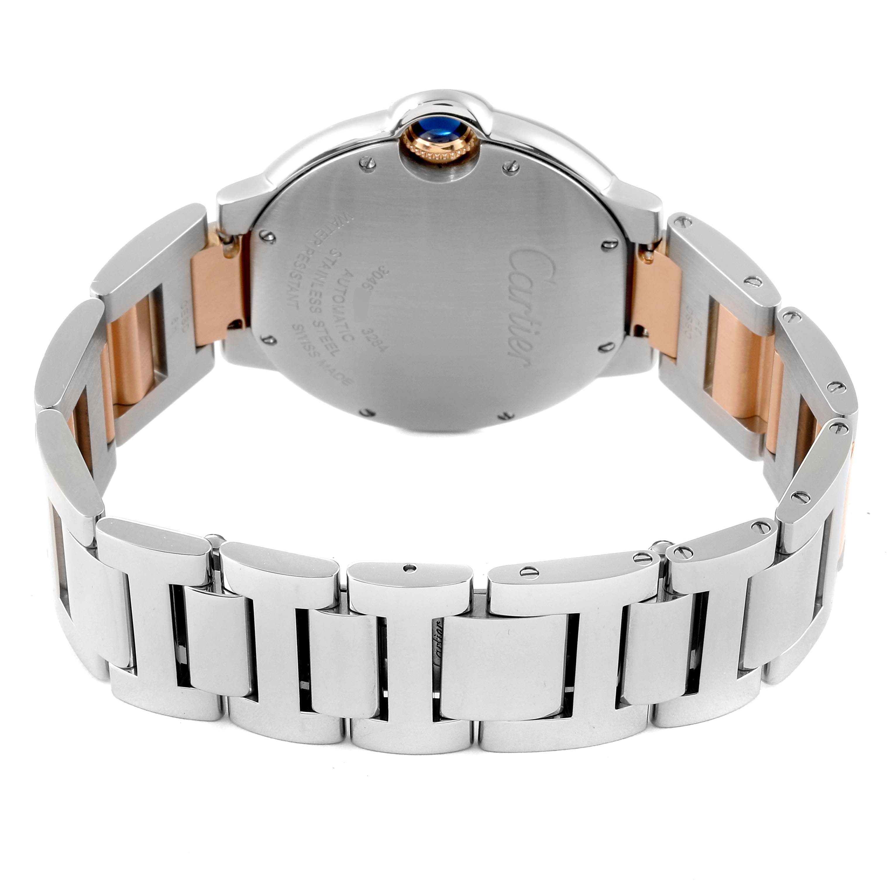 The image shows the back and bracelet of a Cartier Ballon Bleu W6920033 Women's Steel and Gold (two tone) Mother of Pearl Dial W6920033 Women's Steel and Gold (two tone) Mother of Pearl Dial watch, displaying its case back and metal links.