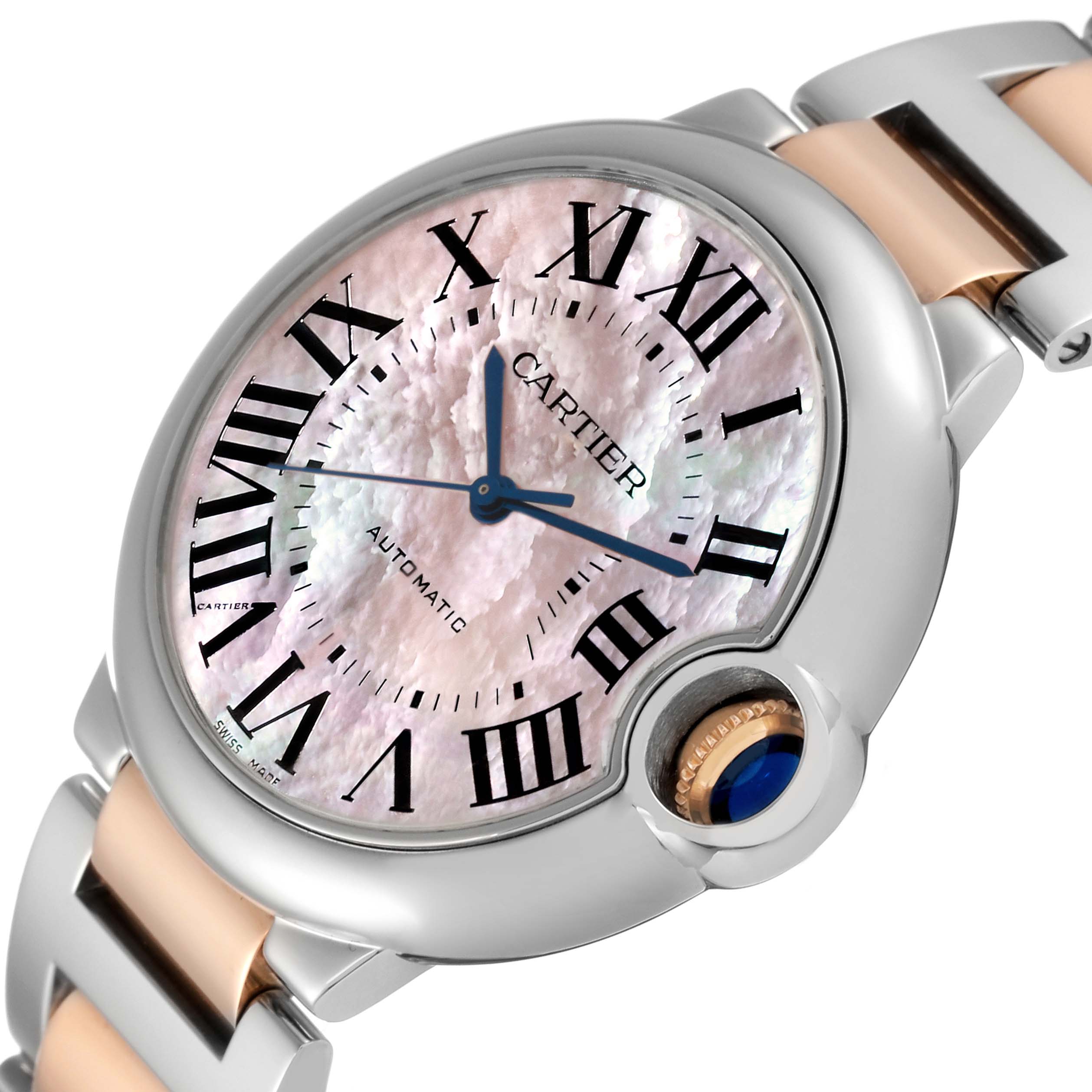 This image shows a close-up of the Cartier Ballon Bleu W6920033 Women's Steel and Gold (two tone) Mother of Pearl Dial W6920033 Women's Steel and Gold (two tone) Mother of Pearl Dial watch, highlighting its dial, Roman numerals, and part of the bracelet.