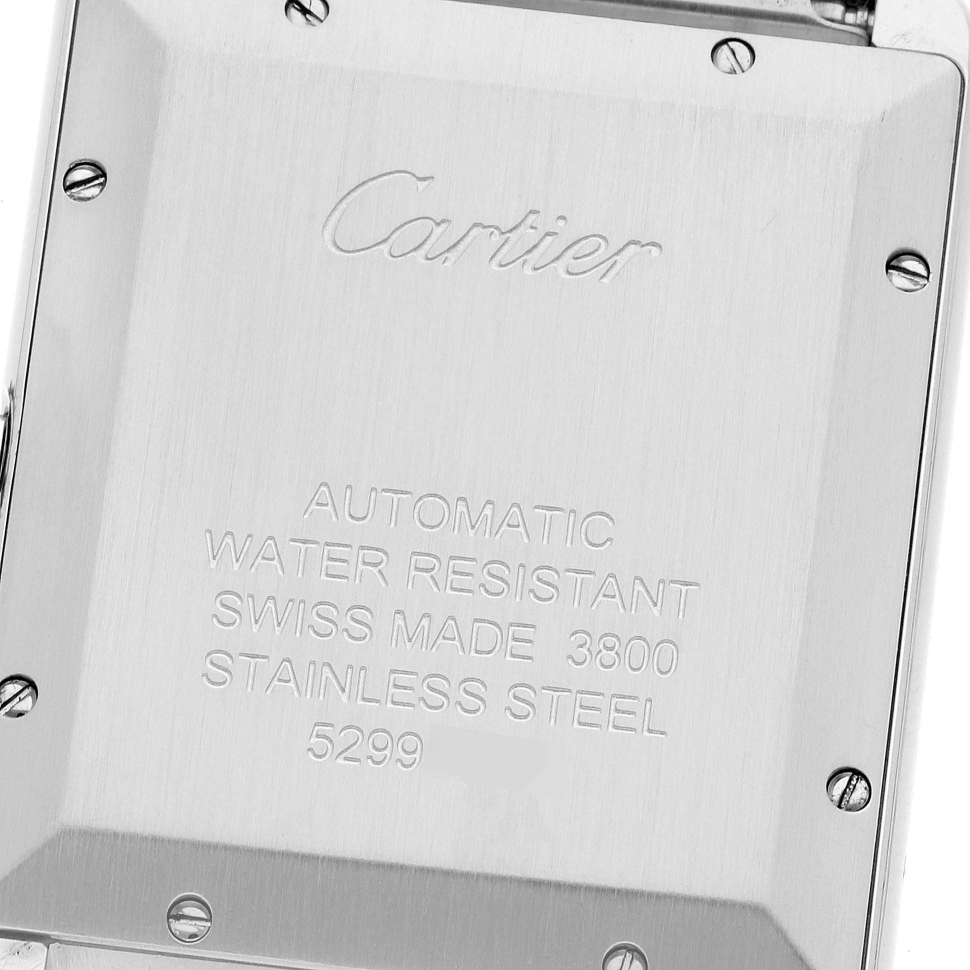 This image shows the back case of the Cartier Tank Solo W5200028 Men's Stainless Steel Silver Dial W5200028 Men's Stainless Steel Silver Dial watch, displaying its engravings and screws.