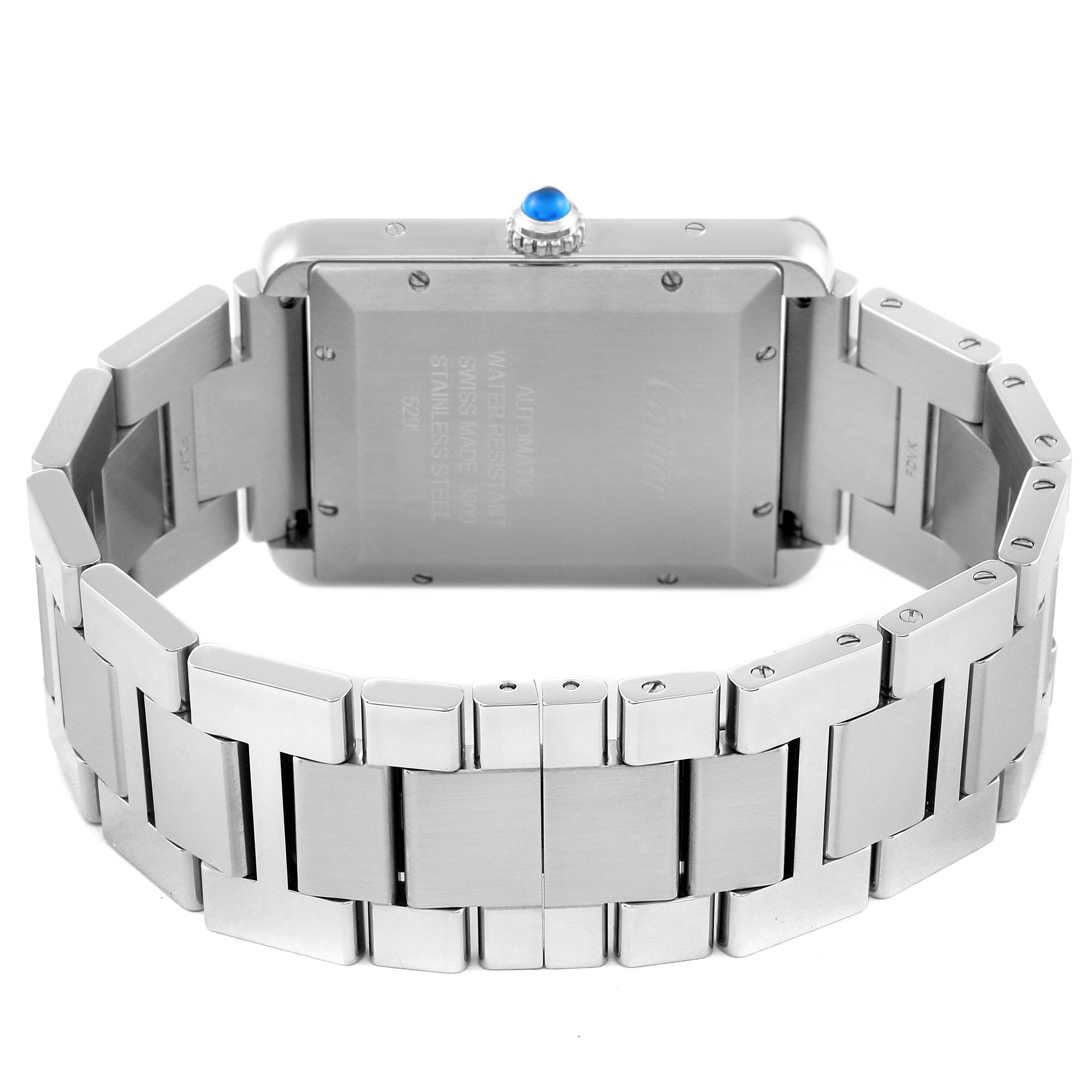 The image shows the back and bracelet of a Cartier Tank Solo W5200028 Men's Stainless Steel Silver Dial W5200028 Men's Stainless Steel Silver Dial watch, highlighting its stainless steel case and blue cabochon crown.