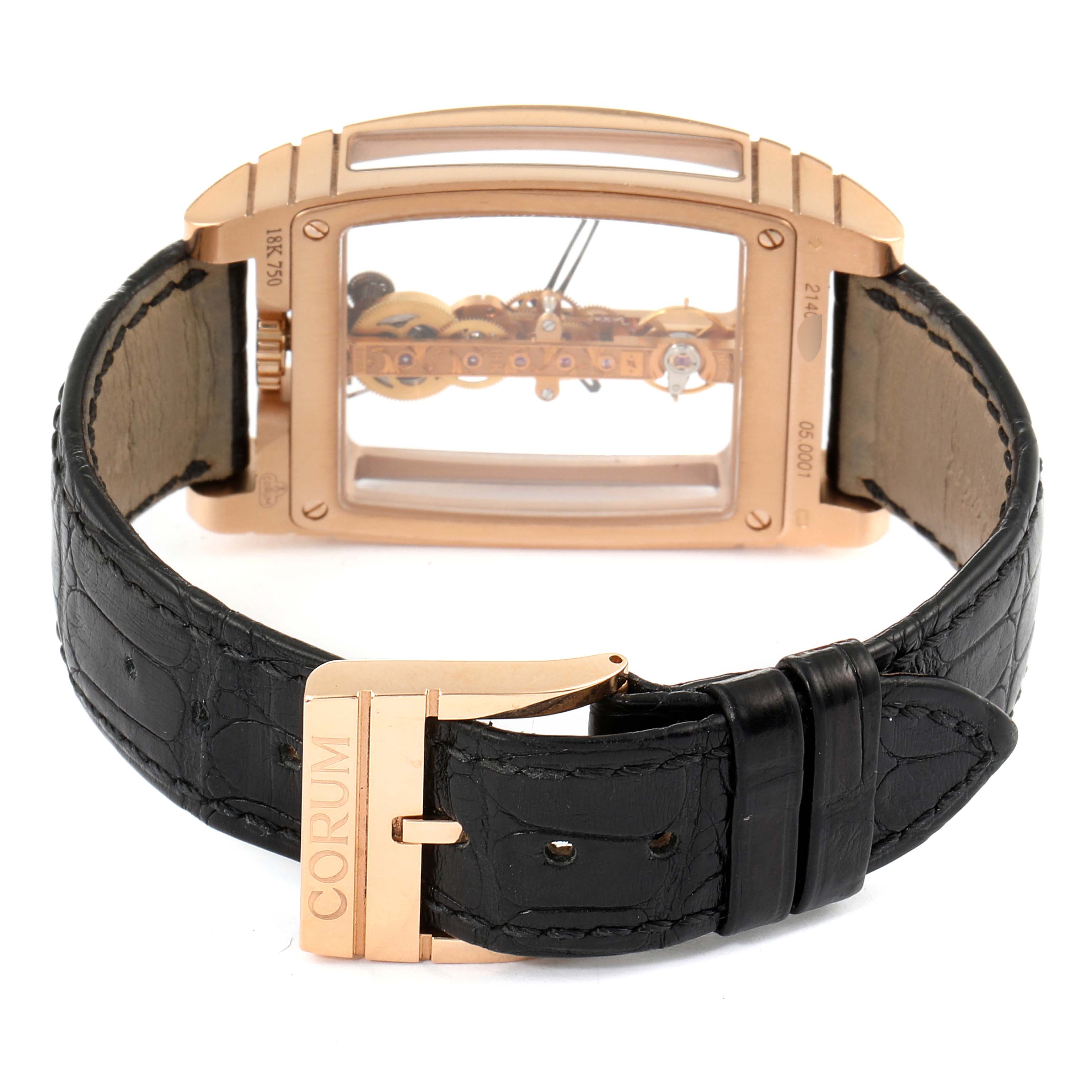 The image shows the back view of the Corum Golden Bridge B113/01043 - 113.160.55/0002 0000 Men's Rose Gold Transparent Dial B113/01043 - 113.160.55/0002 0000 Men's Rose Gold Transparent Dial watch, highlighting its leather strap and intricate inner mechanisms.