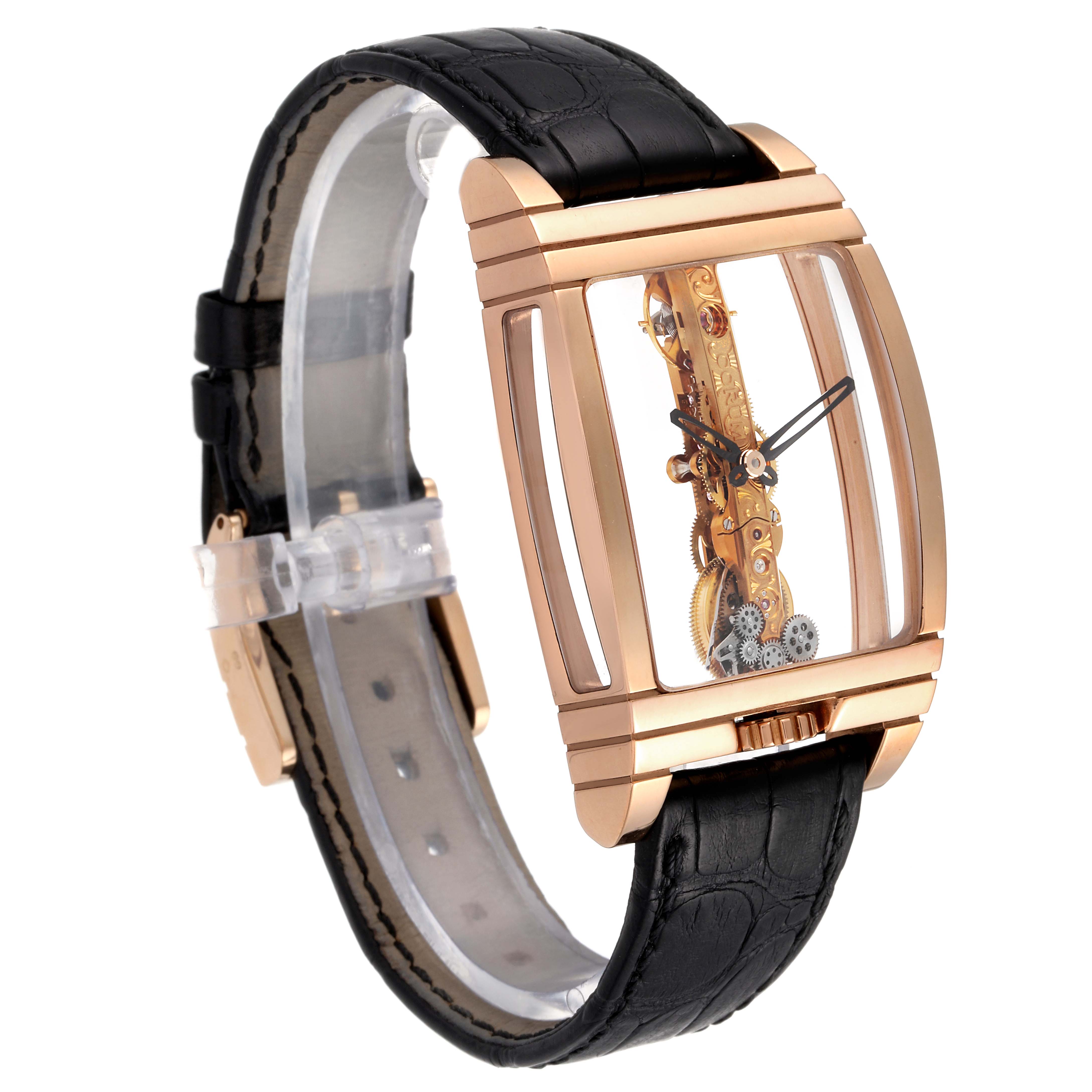 The Corum Golden Bridge B113/01043 - 113.160.55/0002 0000 Men's Rose Gold Transparent Dial B113/01043 - 113.160.55/0002 0000 Men's Rose Gold Transparent Dial watch is shown at an angle displaying its intricate watch movement and black leather strap.