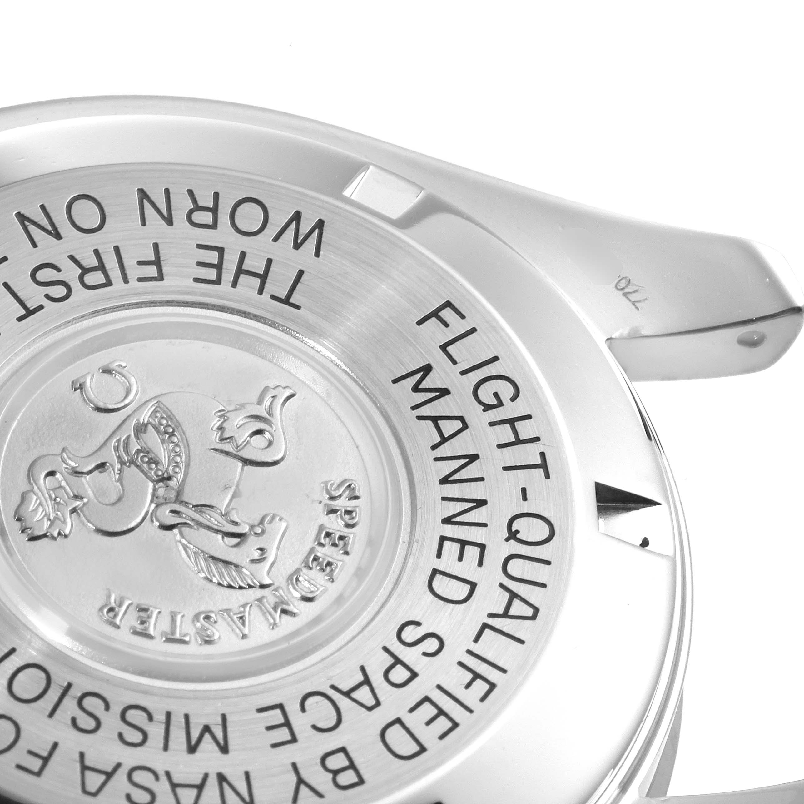 The image shows the case back of the Omega Speedmaster 3570.50.00 Men
s Stainless Steel Black Dial 3570.50.00 Men
s Stainless Steel Black Dial, highlighting its engraved text and emblem.