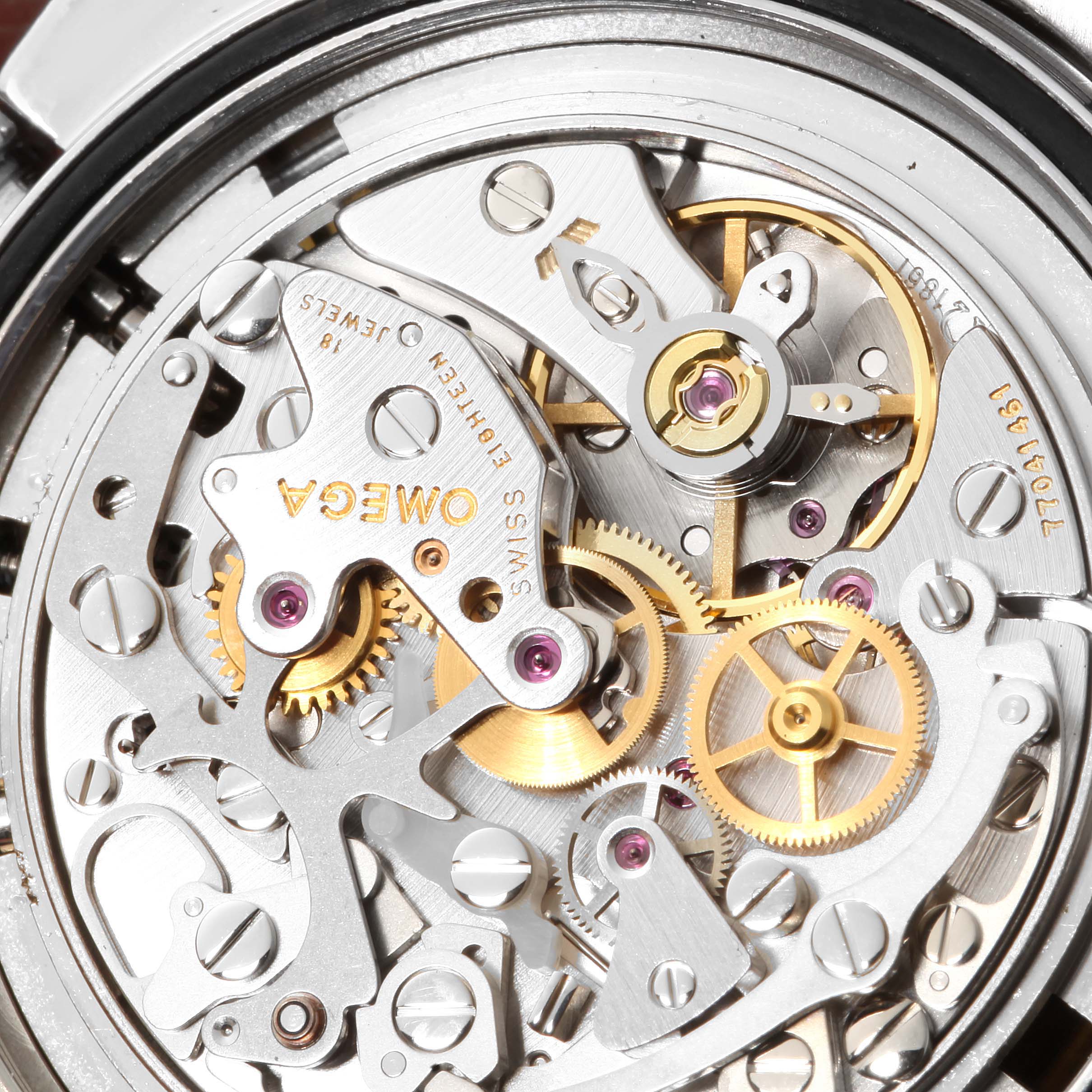 The image shows a close-up view of the movement components of an Omega Speedmaster 3570.50.00 Men
s Stainless Steel Black Dial 3570.50.00 Men
s Stainless Steel Black Dial watch.