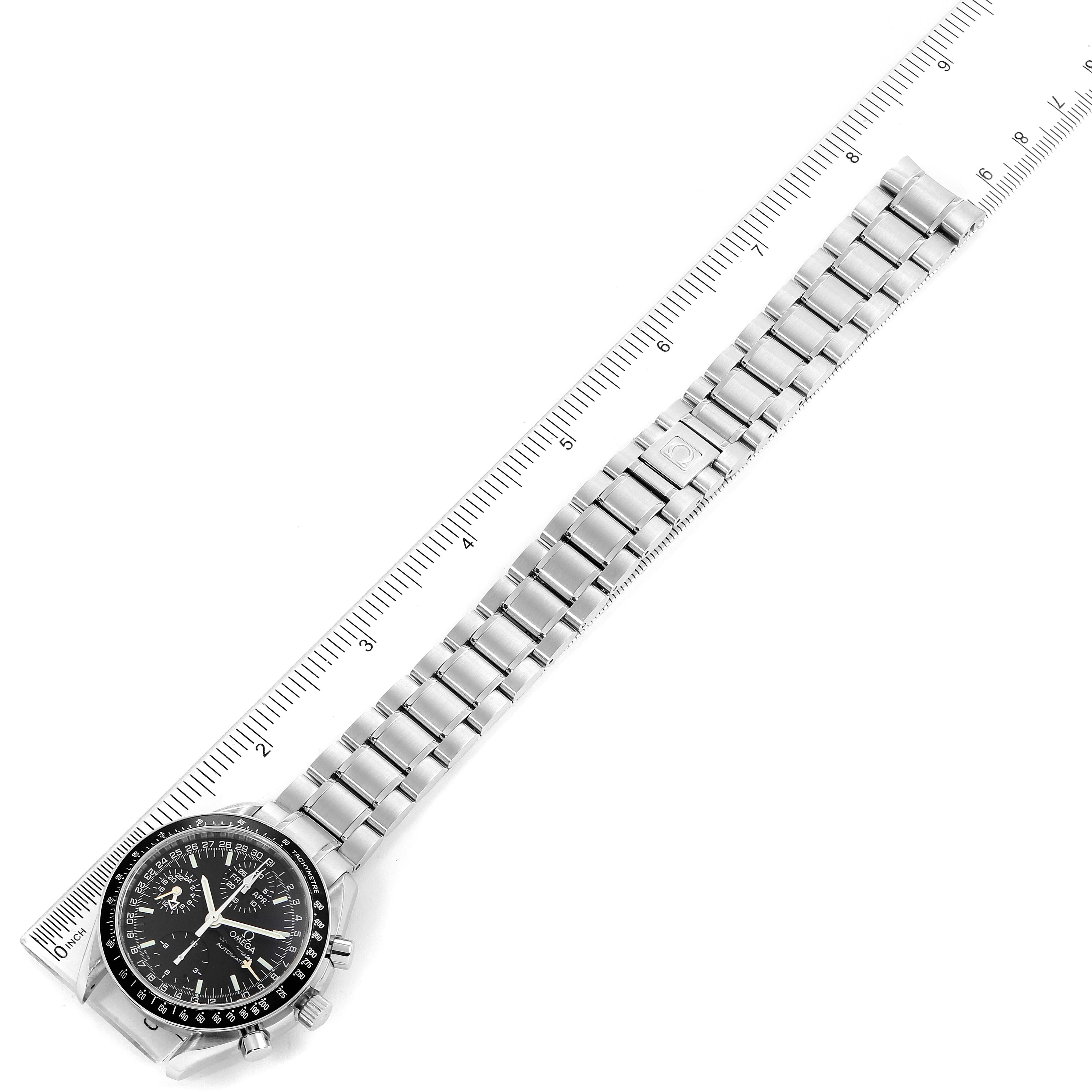 The image shows an Omega Speedmaster 3520.50.00 Men
s Stainless Steel  3520.50.00 Men
s Stainless Steel  watch laid flat, with a straight-on view of the face, bezel, case, and full metal bracelet alongside a straight ruler.