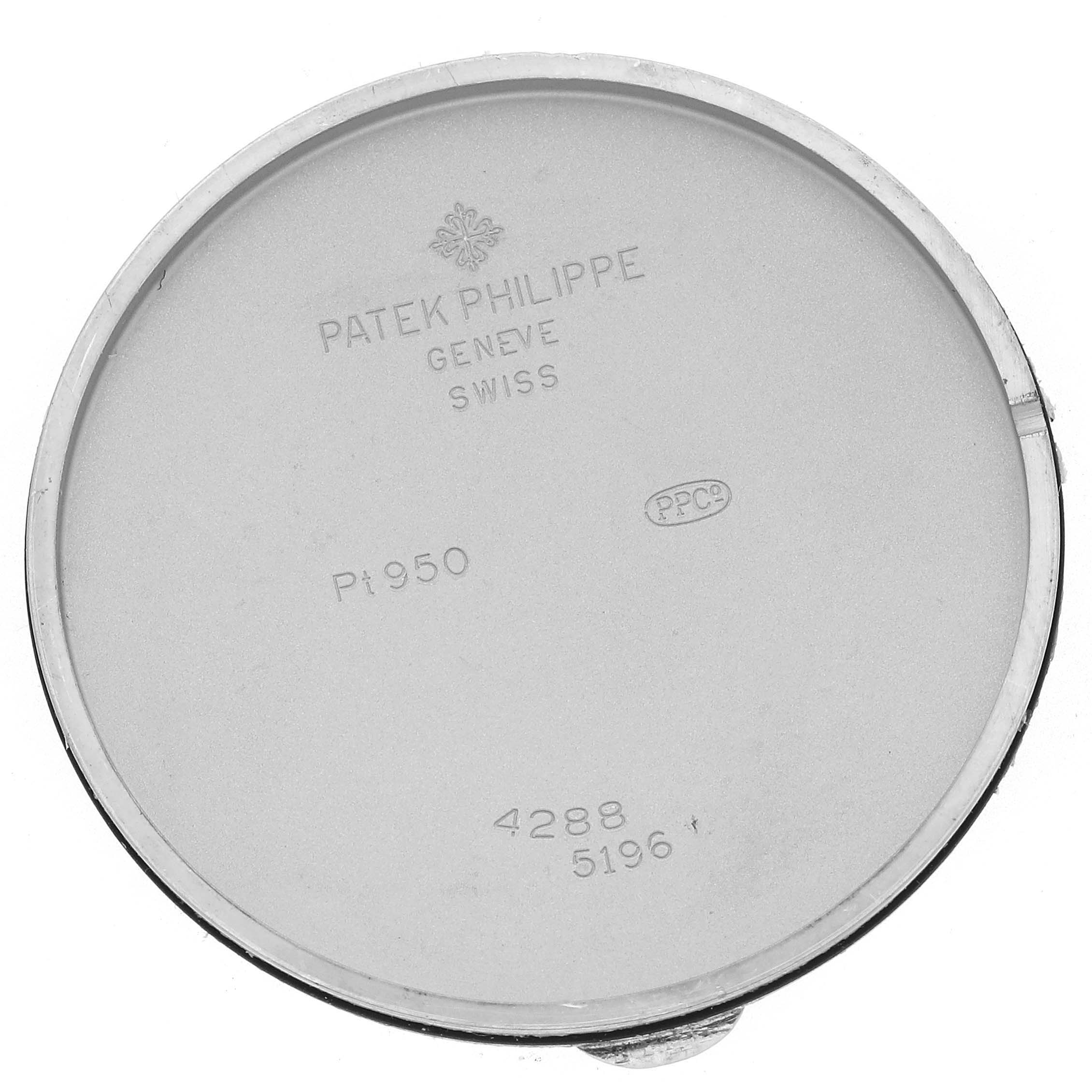 The image shows the inside case back of a Patek Philippe Calatrava 5196P-001 Men's Platinum Silver Dial 5196P-001 Men's Platinum Silver Dial watch, displaying engravings and hallmark details.