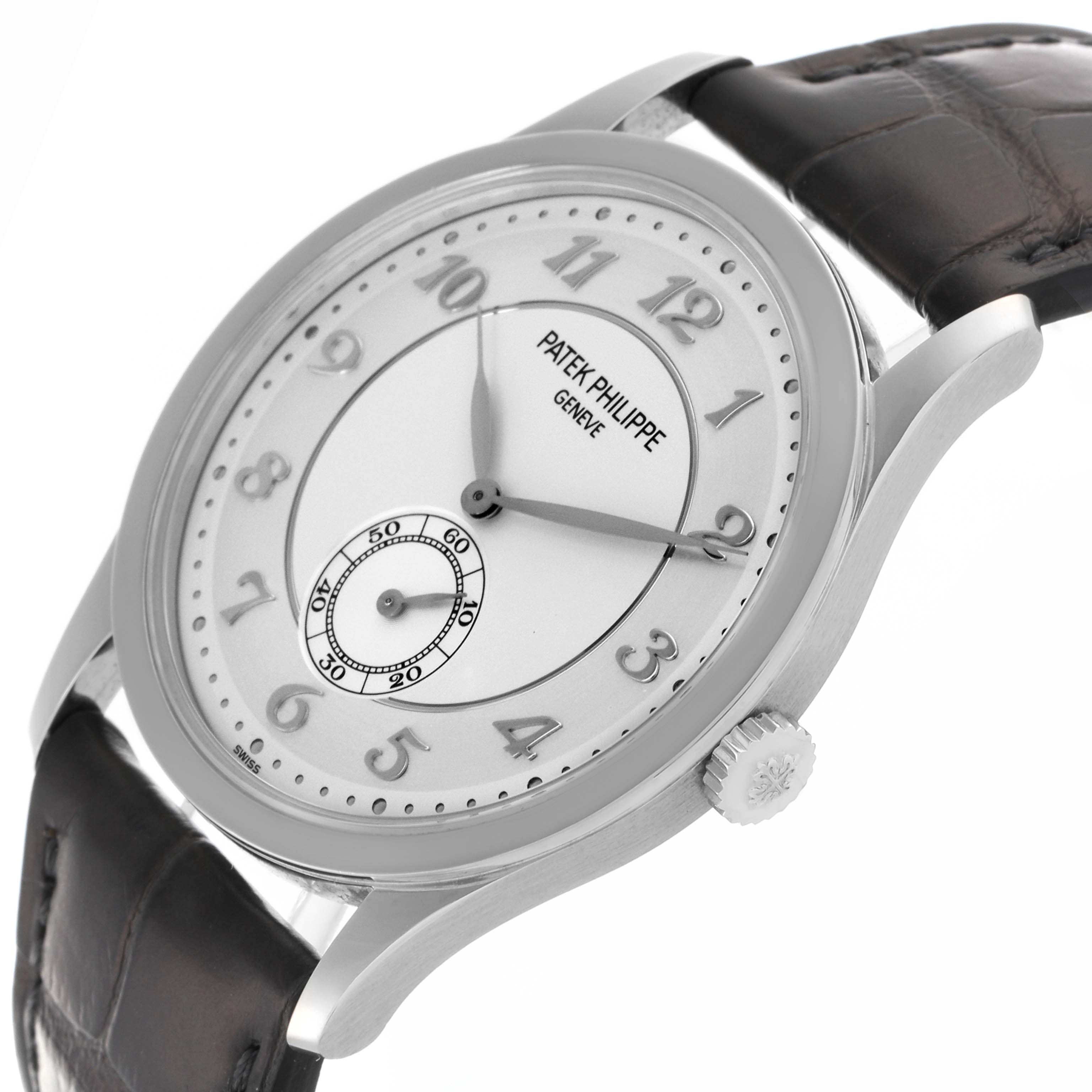 The Patek Philippe Calatrava 5196P-001 Men's Platinum Silver Dial 5196P-001 Men's Platinum Silver Dial watch is shown at a slight angle, displaying the dial, crown, and leather strap.