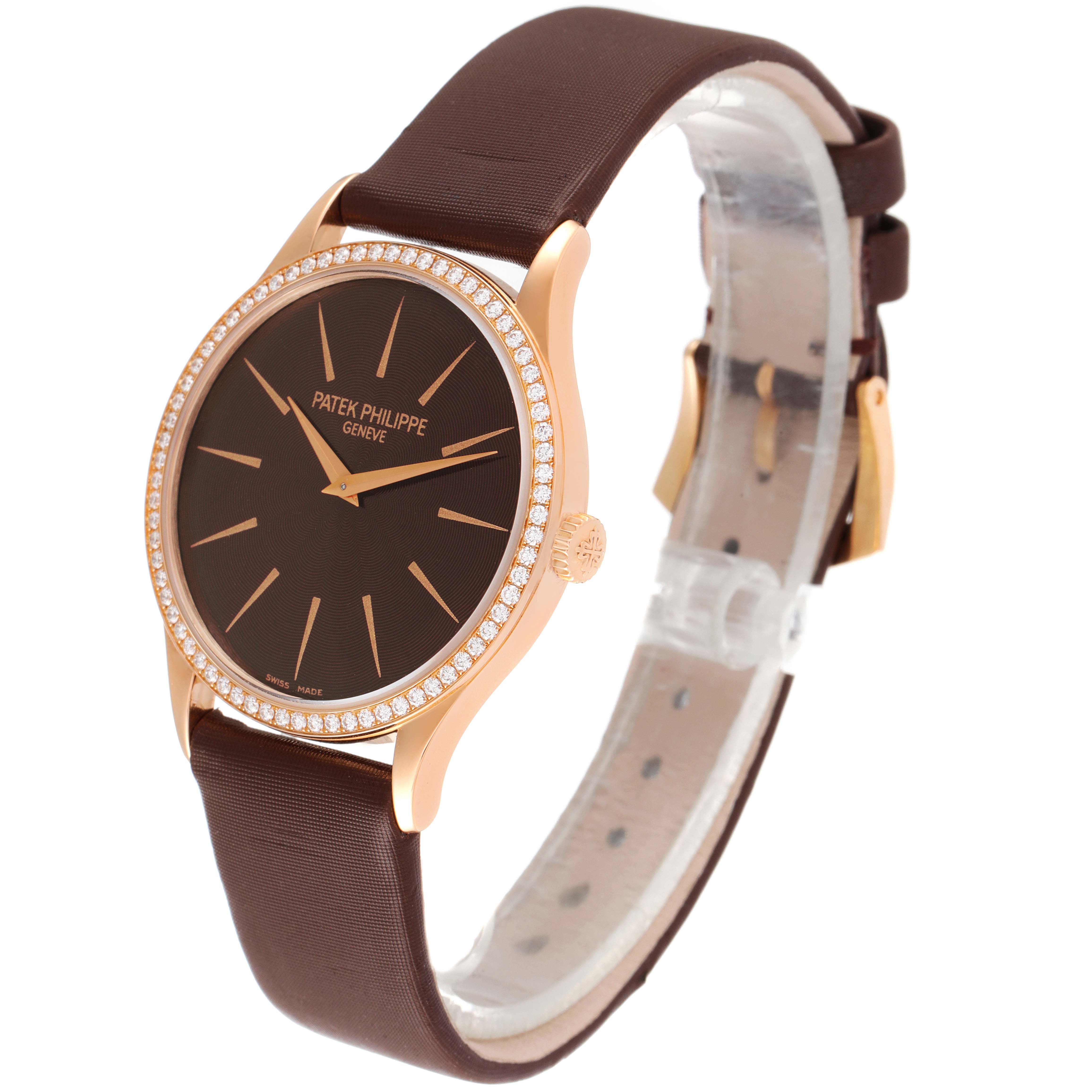 The image shows a side-angle view of the Patek Philippe Calatrava 4897R-001 Women's Rose Gold Brown Dial 4897R-001 Women's Rose Gold Brown Dial watch, highlighting the watch face, bezel, and strap.