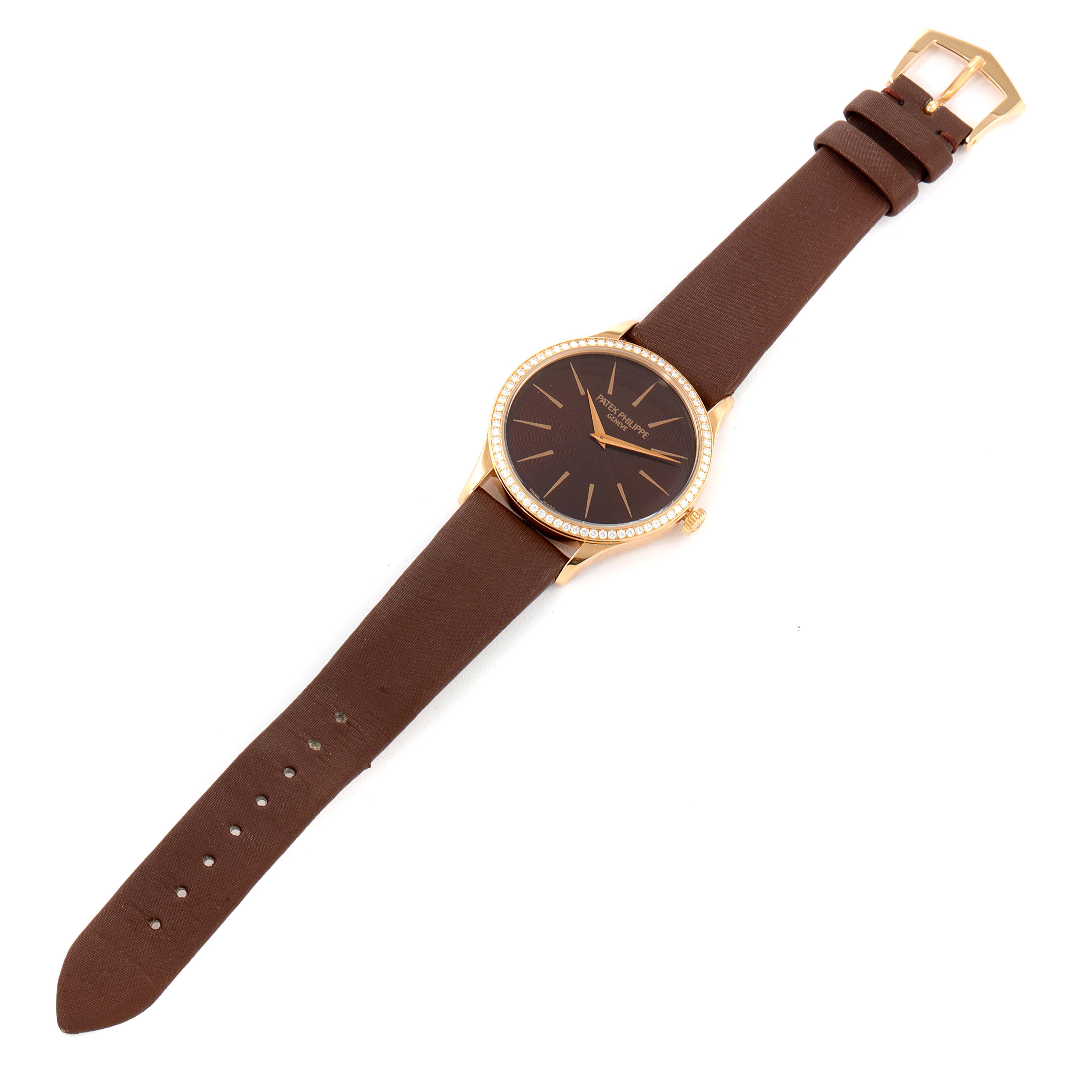 The image shows a Patek Philippe Calatrava 4897R-001 Women's Rose Gold Brown Dial 4897R-001 Women's Rose Gold Brown Dial watch viewed from above, displaying the dial, case, and leather strap.
