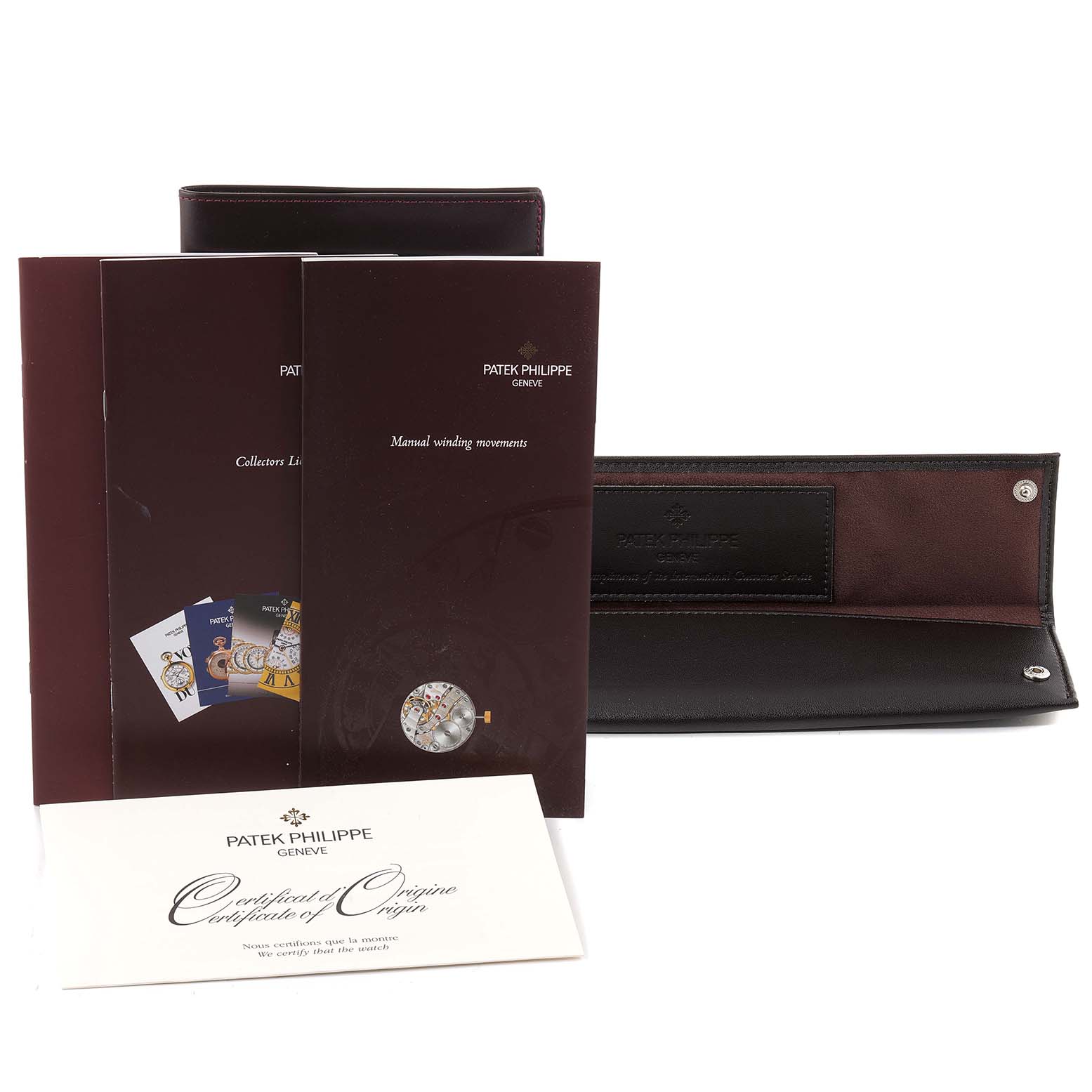 The image shows the Patek Philippe Calatrava 5006R Men's Rose Gold Silver Dial 5006R Men's Rose Gold Silver Dial accessories, including manuals, a certificate of origin, and a leather case, from a front angle. 