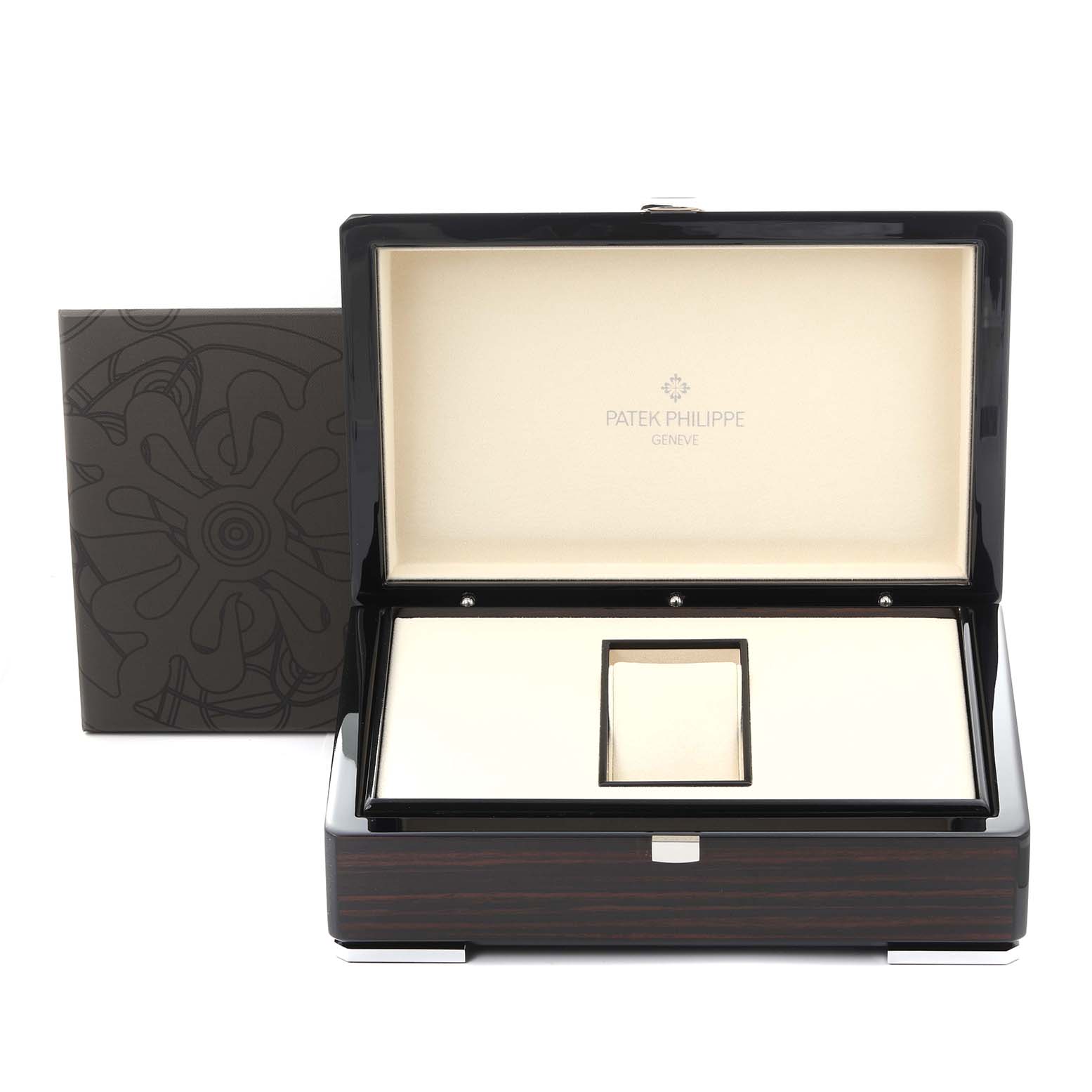 The image shows an open box for a Patek Philippe Calatrava 5140G-001 Men's Stainless Steel Silver Dial 5140G-001 Men's Stainless Steel Silver Dial watch, showcasing its luxurious interior from a front angle.