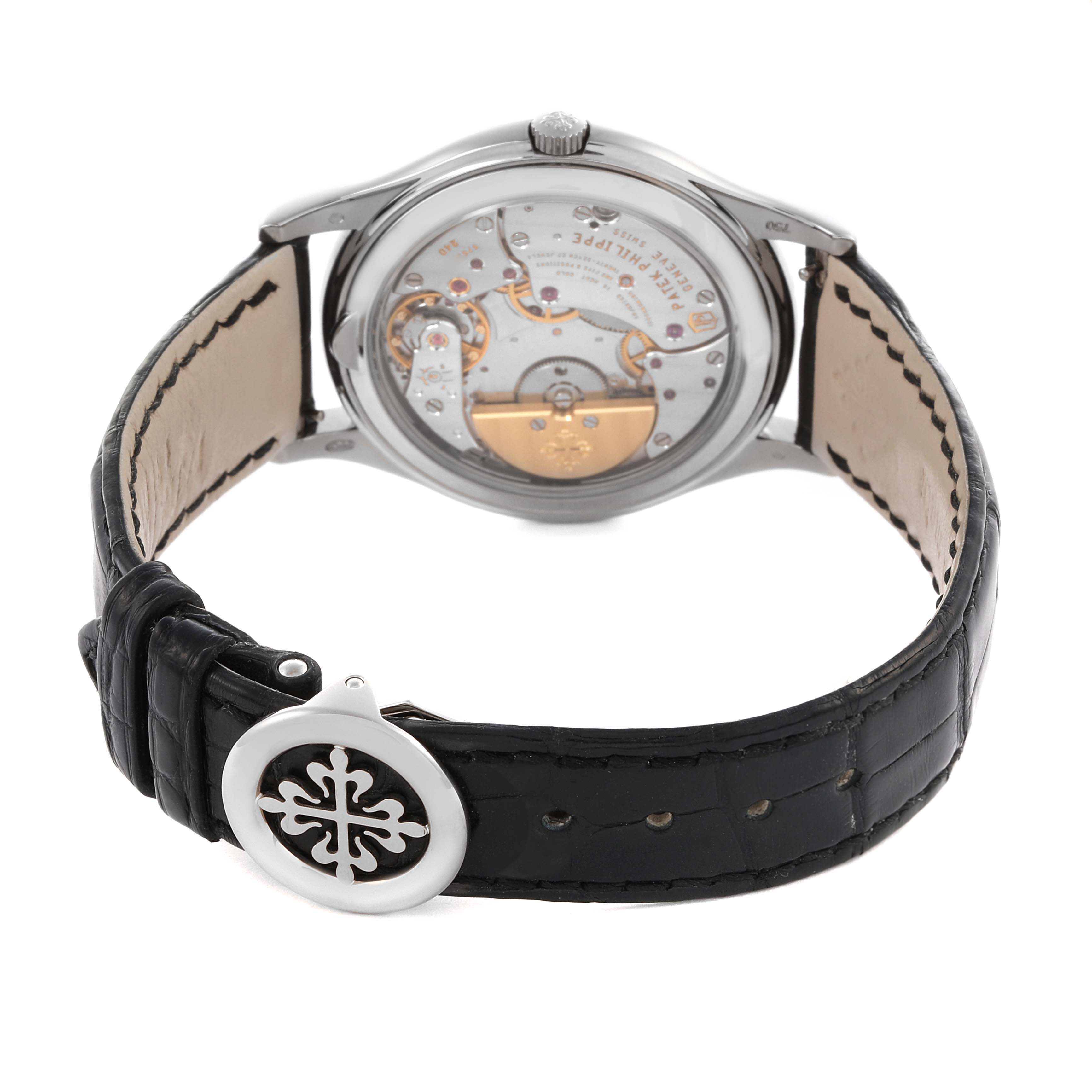 The image shows the back of the Patek Philippe Calatrava 5140G-001 Men's Stainless Steel Silver Dial 5140G-001 Men's Stainless Steel Silver Dial, highlighting its movement and black leather strap with buckle.