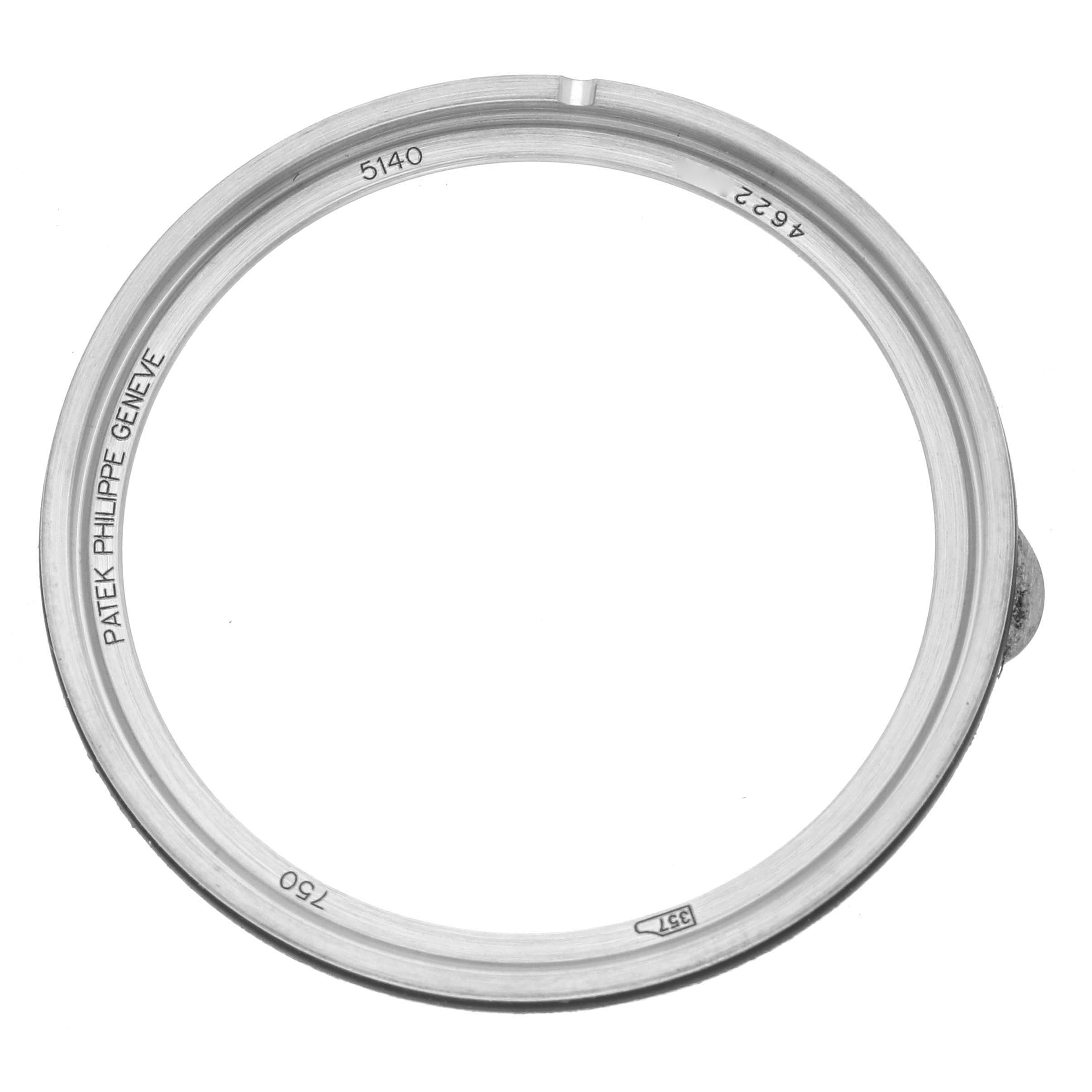 The image shows a close-up of the bezel for the Patek Philippe Calatrava 5140G-001 Men's Stainless Steel Silver Dial 5140G-001 Men's Stainless Steel Silver Dial watch, labeled with reference numbers.