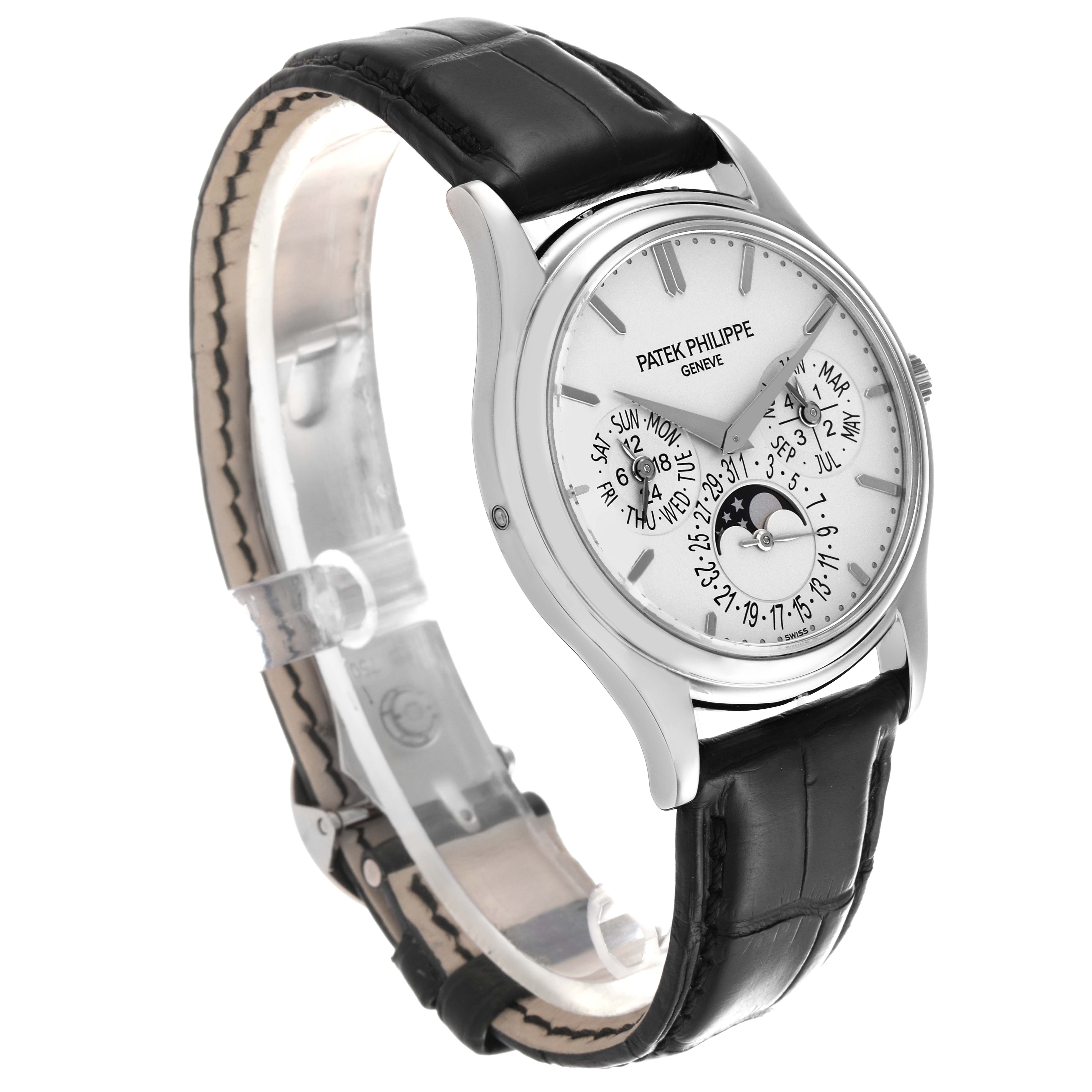 The Patek Philippe Calatrava 5140G-001 Men's Stainless Steel Silver Dial 5140G-001 Men's Stainless Steel Silver Dial watch is shown at a three-quarter angle, highlighting the face, case, and black leather strap.