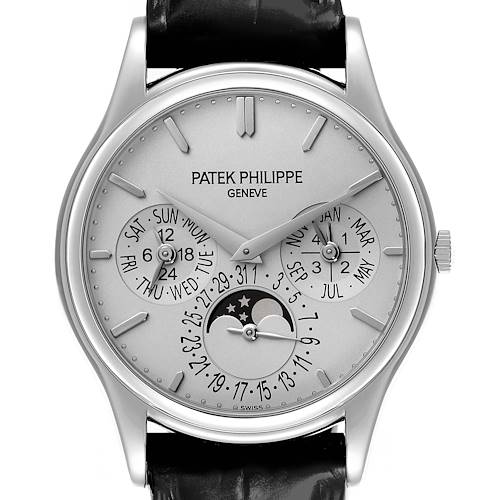 The Patek Philippe Calatrava watch is shown from the front, displaying the dial, hands, and calendar complications.