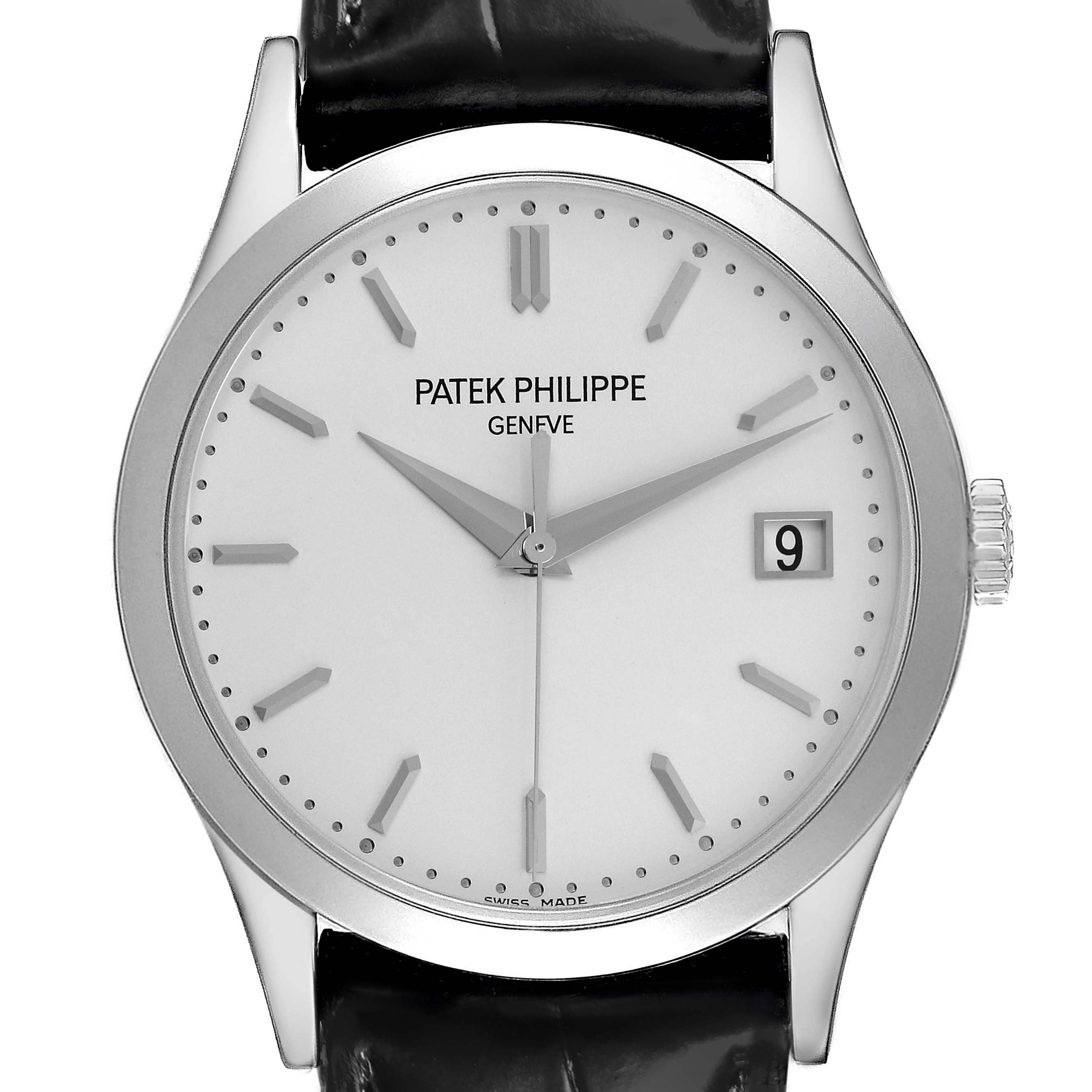 The image shows a front view of the Patek Philippe Calatrava 5296G-010 Men
s White Gold Silver Dial 5296G-010 Men
s White Gold Silver Dial watch, highlighting the dial, hands, date, and crown.
