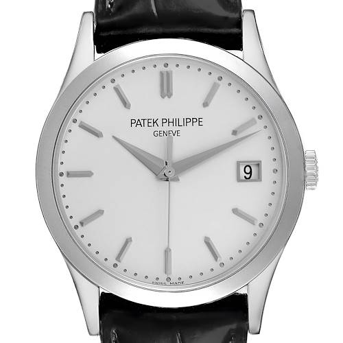 The Patek Philippe Calatrava watch is shown from a front angle, displaying its dial, hands, bezel, and date window.