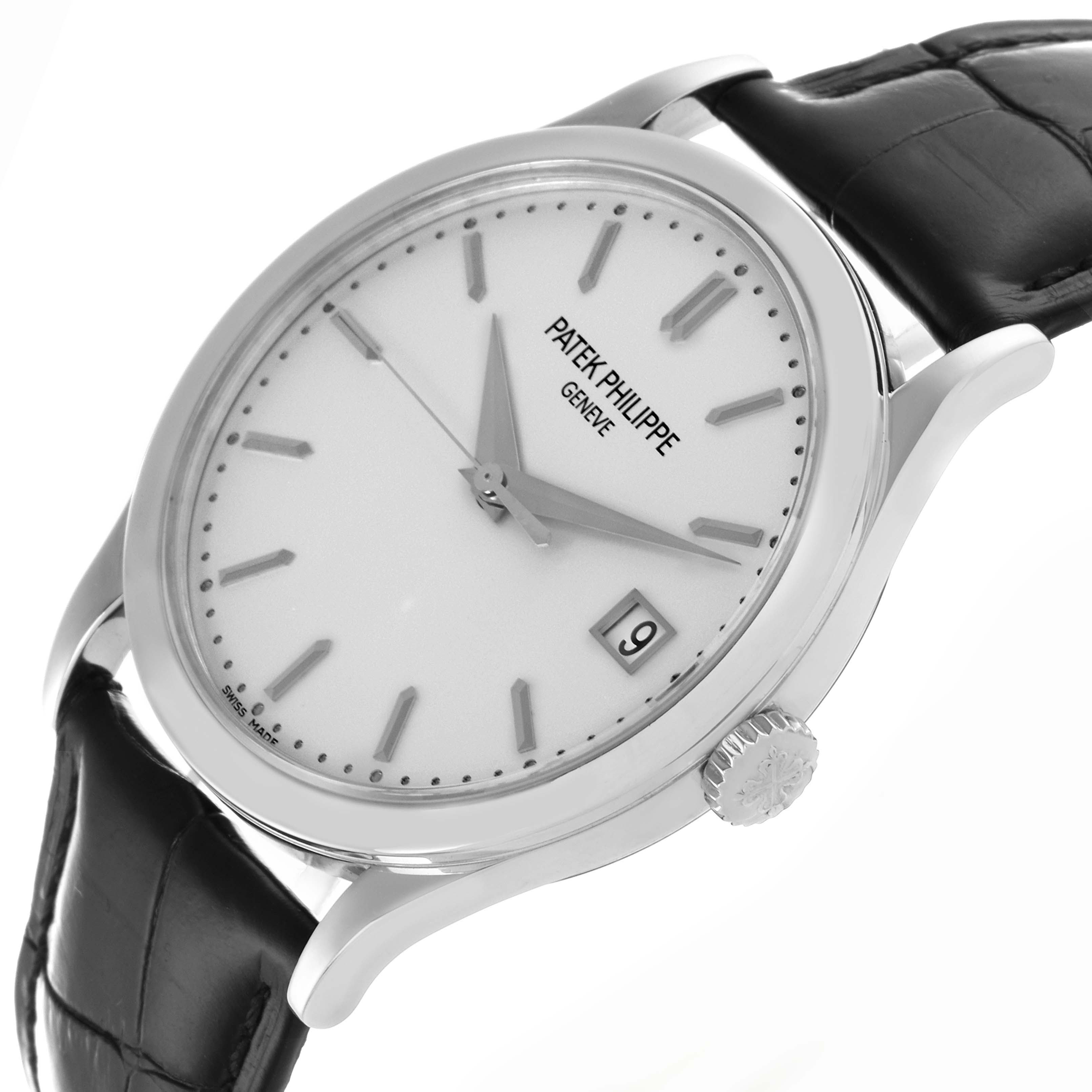 The Patek Philippe Calatrava 5296G-010 Men
s White Gold Silver Dial 5296G-010 Men
s White Gold Silver Dial watch is shown at a slight angle highlighting the dial, hands, date window, and crown with a leather strap.