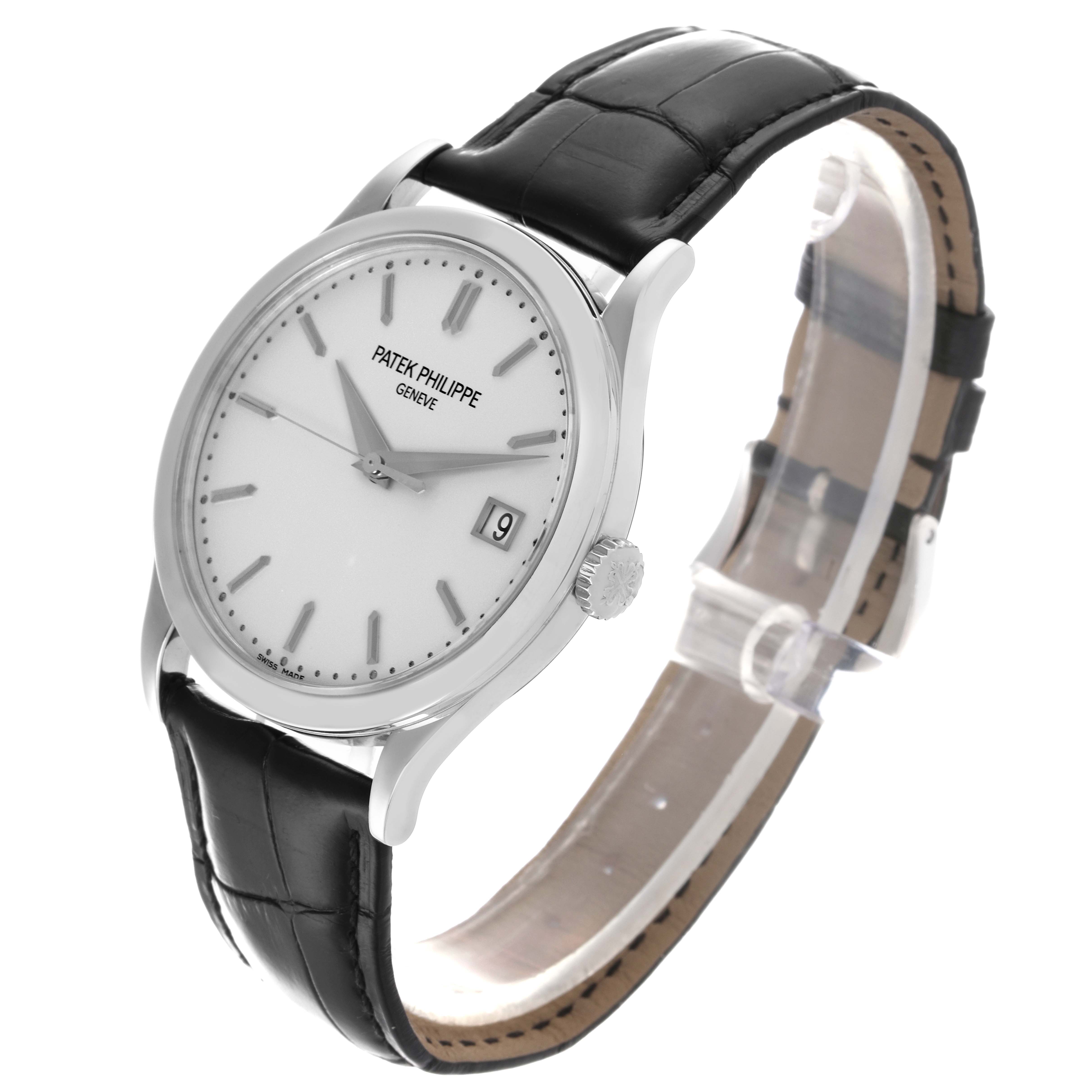 The Patek Philippe Calatrava 5296G-010 Men
s White Gold Silver Dial 5296G-010 Men
s White Gold Silver Dial watch is shown from a three-quarter angle, displaying the face, case, crown, and leather strap.