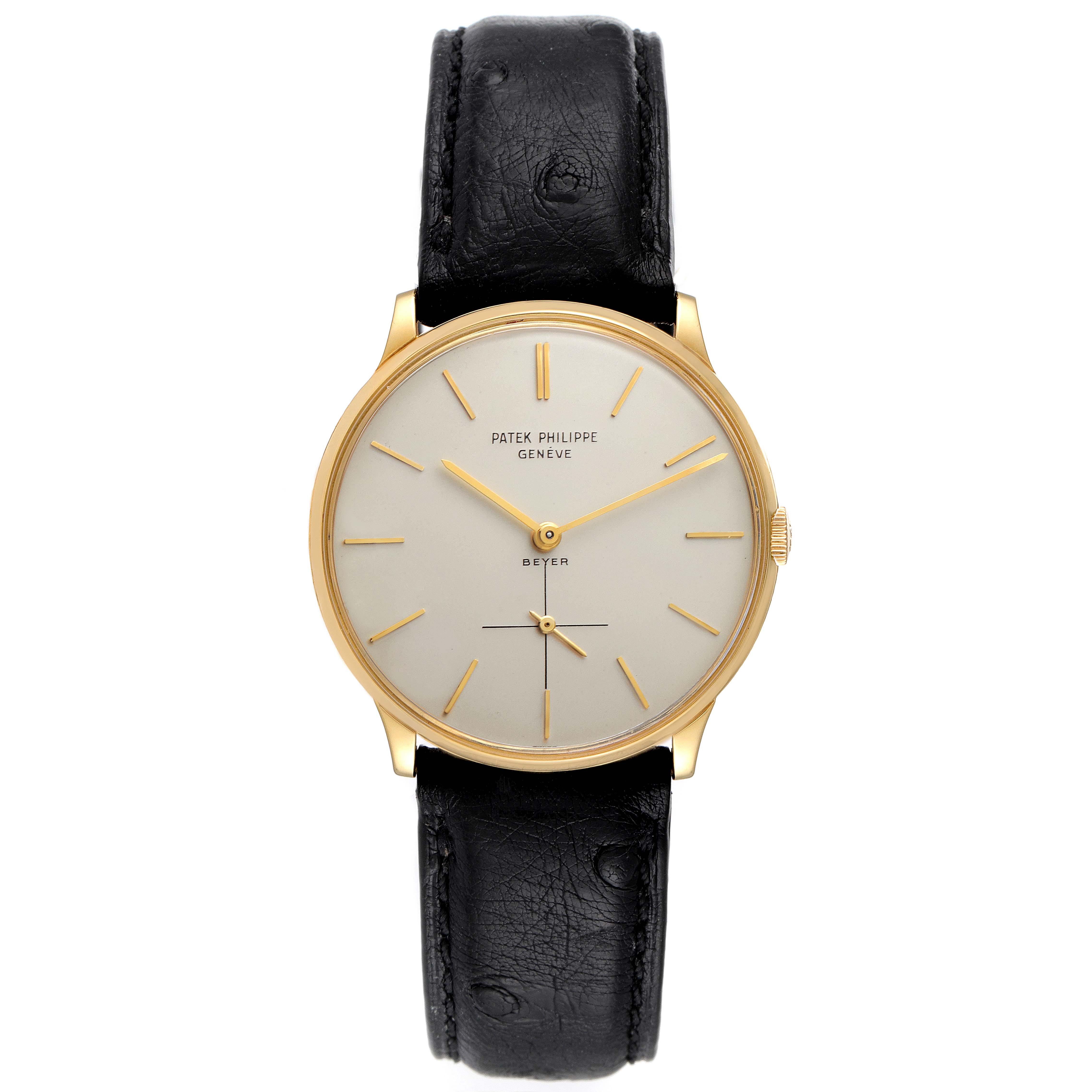The image shows a front view of a Vintage Patek Philippe watch, highlighting its dial, hands, and black leather strap.