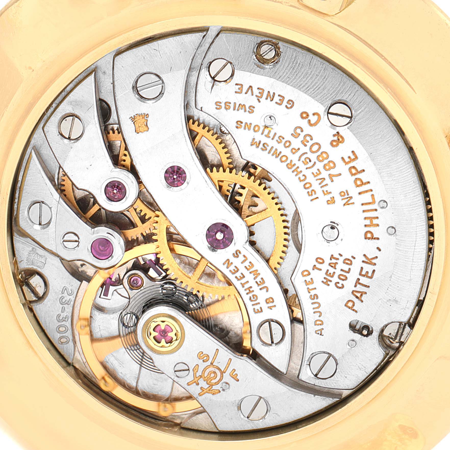 The image shows the intricate movement and internal mechanism of a Vintage Patek Philippe watch.