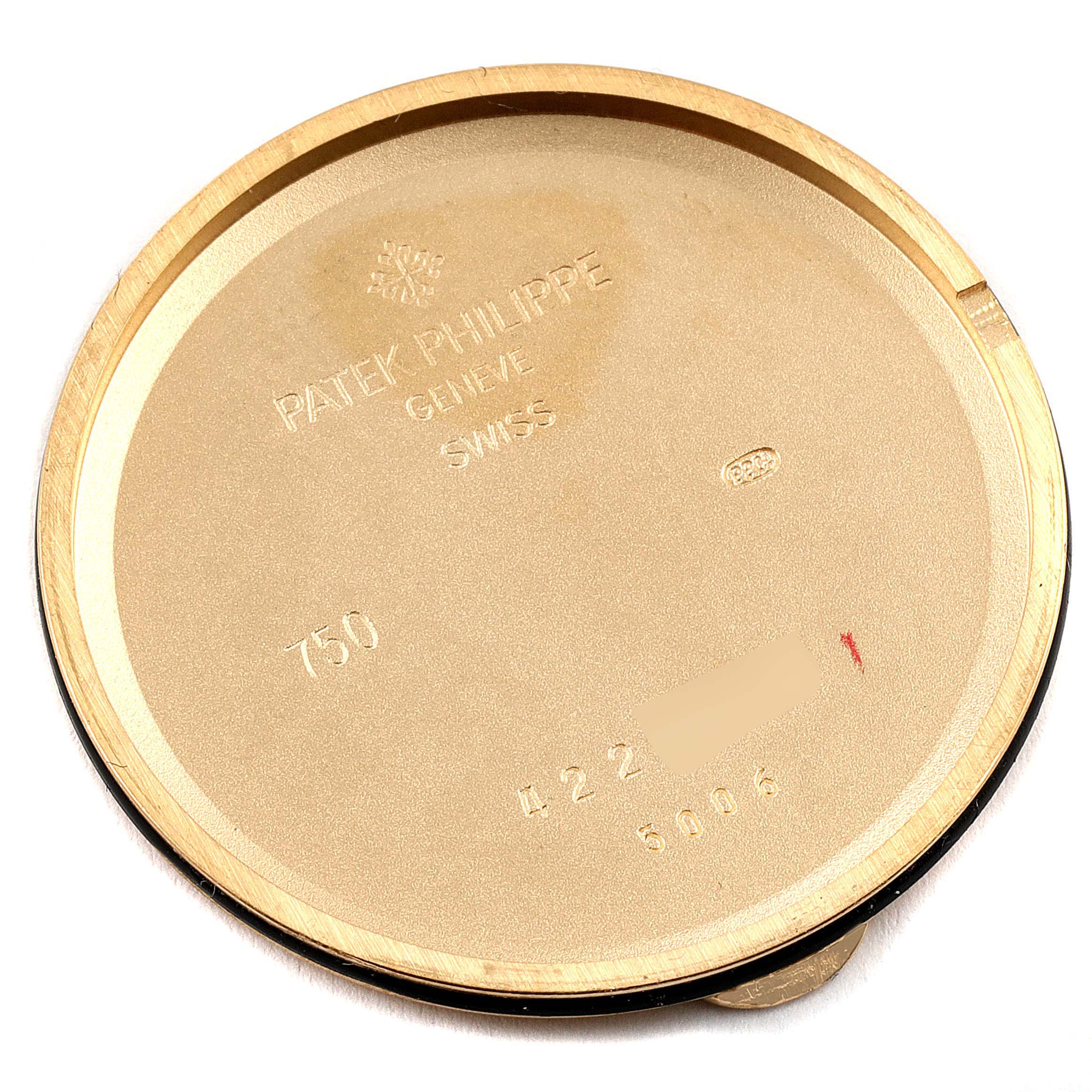 This image shows the inner back cover of a Patek Philippe Calatrava 5006J Men's Yellow Gold White Dial 5006J Men's Yellow Gold White Dial watch, displaying its engravings.