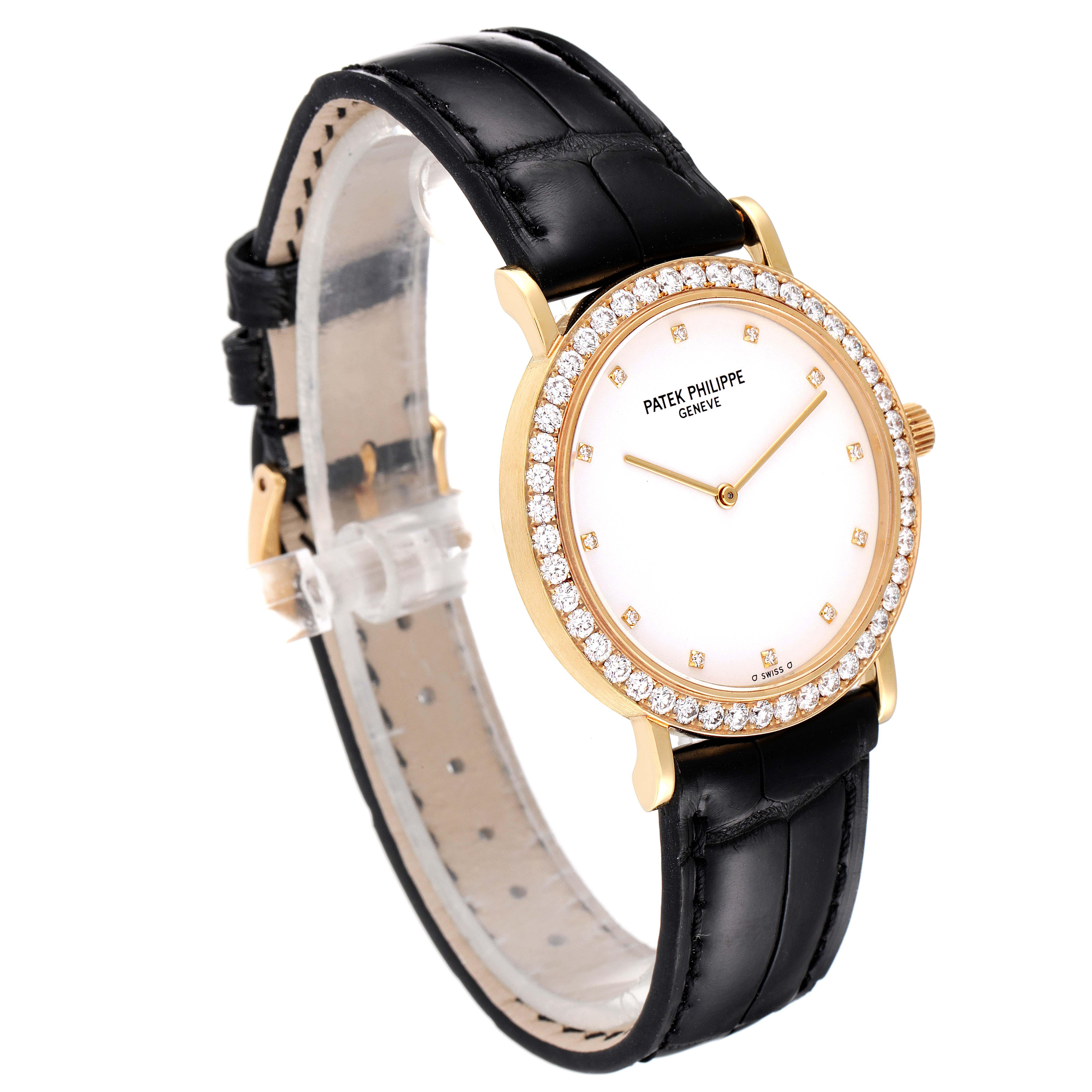 The image shows a Patek Philippe Calatrava 5006J Men's Yellow Gold White Dial 5006J Men's Yellow Gold White Dial model watch from a side angle, displaying the watch face, bezel, and black leather strap.