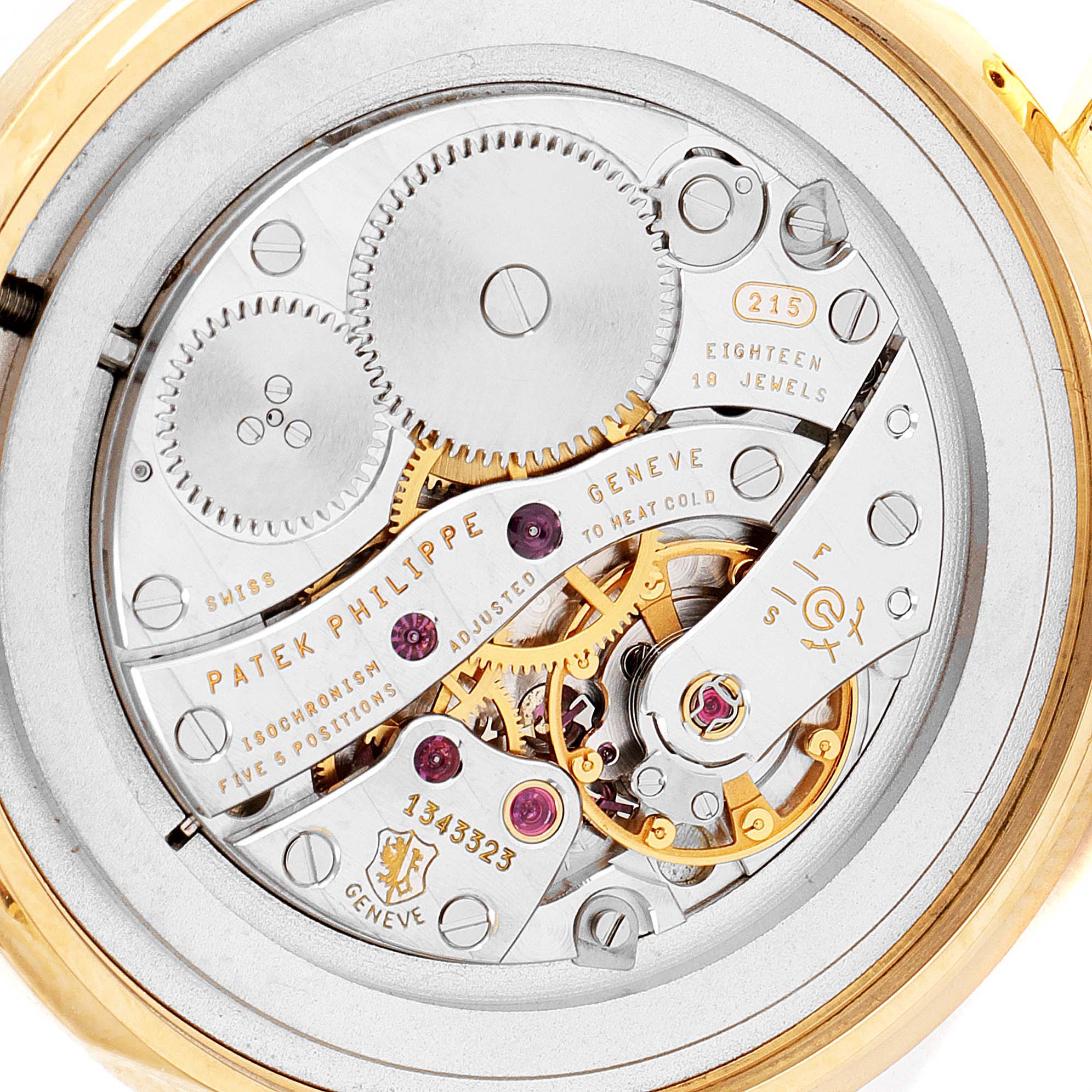The image shows the intricate mechanical movement of a Patek Philippe Calatrava 5006J Men's Yellow Gold White Dial 5006J Men's Yellow Gold White Dial watch from a top-down angle.