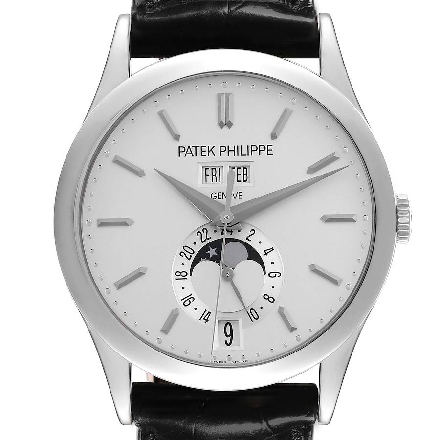 The Patek Philippe Complications watch is shown from the front, displaying the dial, hands, day, date, and moon phase.