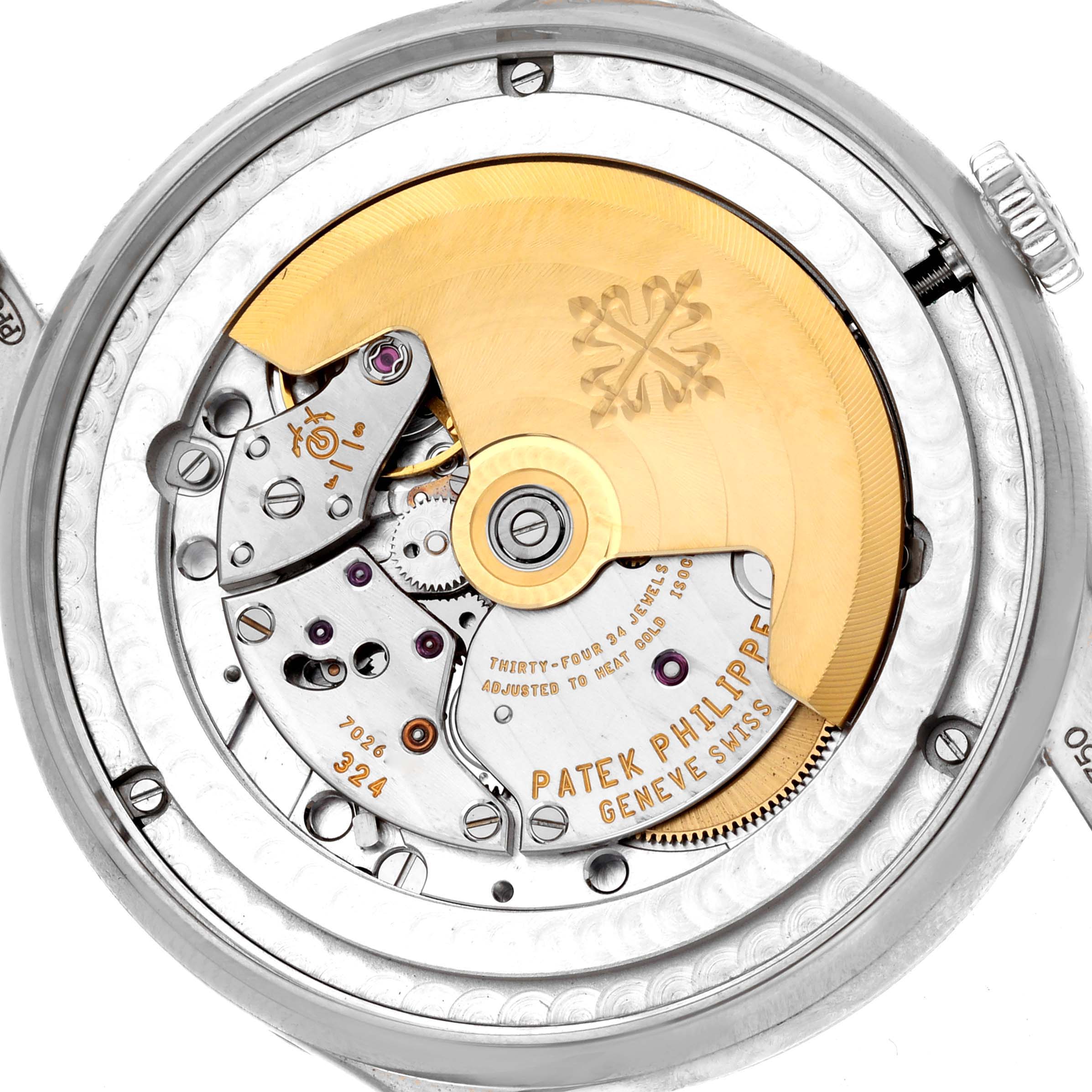 The image shows the back view of a Patek Philippe Complications 5396G-011 Men
s White Gold Silver Dial 5396G-011 Men
s White Gold Silver Dial model, highlighting the intricate movement and rotor.