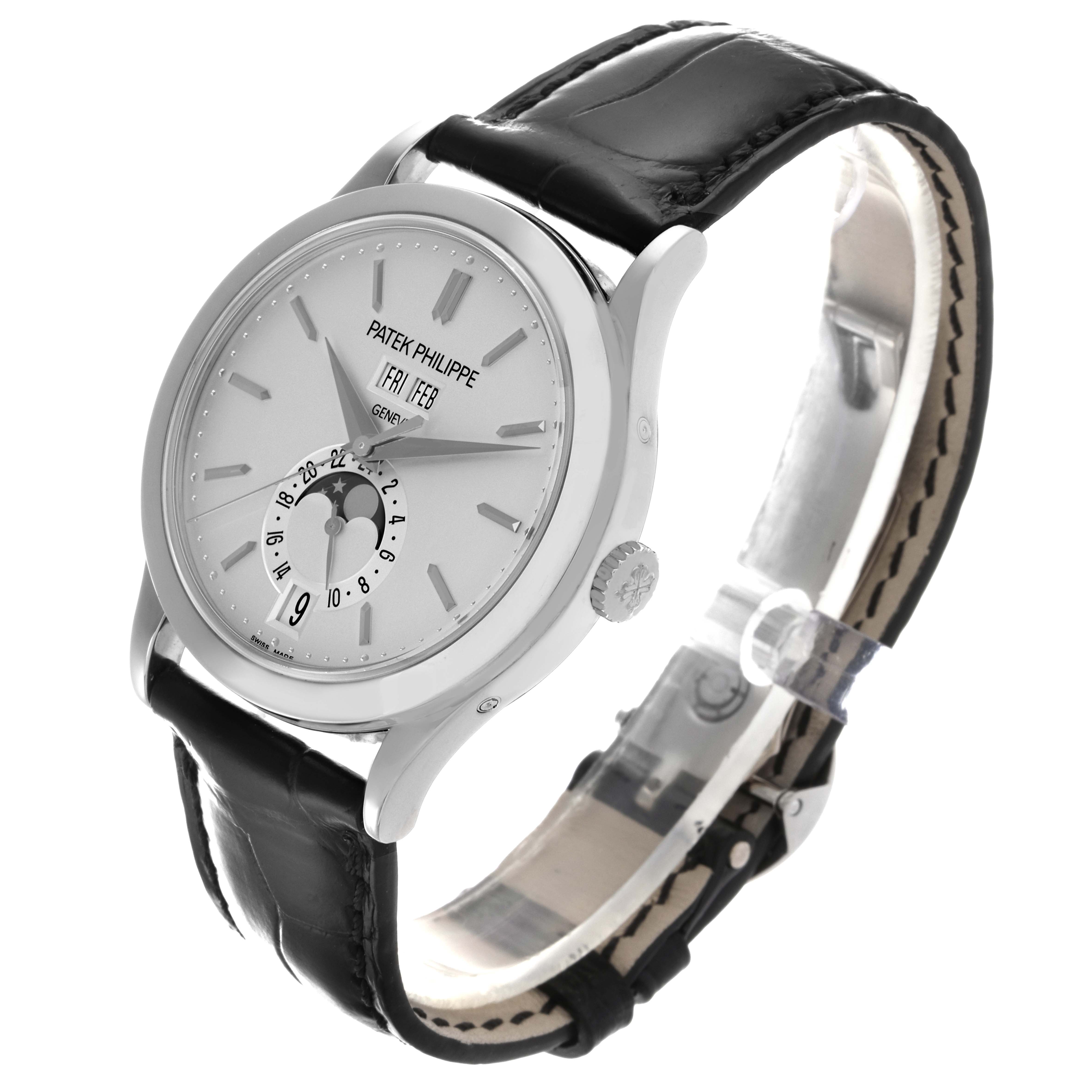 The Patek Philippe Complications 5396G-011 Men
s White Gold Silver Dial 5396G-011 Men
s White Gold Silver Dial watch is shown at a three-quarter angle, highlighting the face, hands, moon phase, and leather strap.