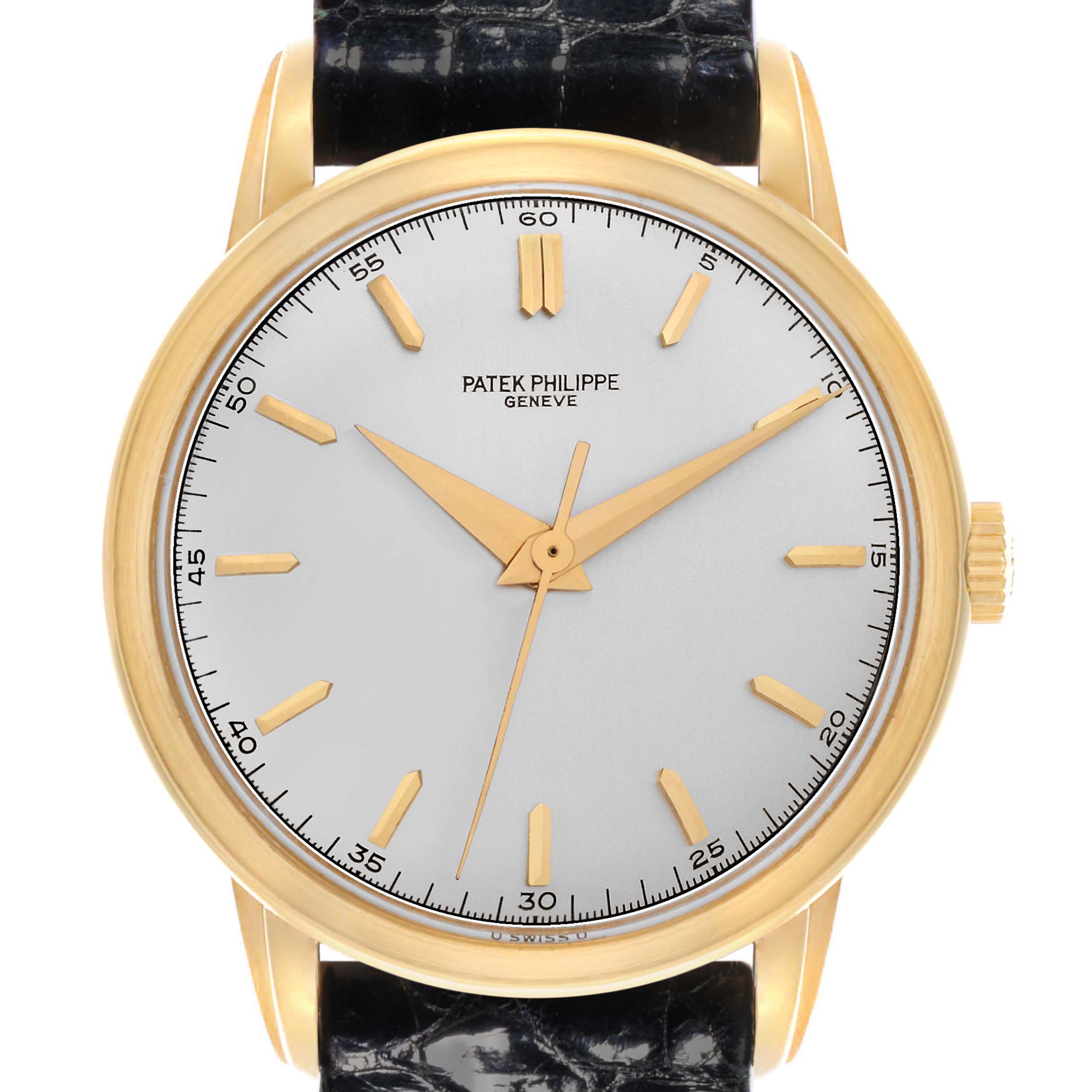 The Patek Philippe Calatrava 2481 Men's Yellow Gold Silver Dial watch is shown from a front angle, highlighting its dial, hands, and strap.
